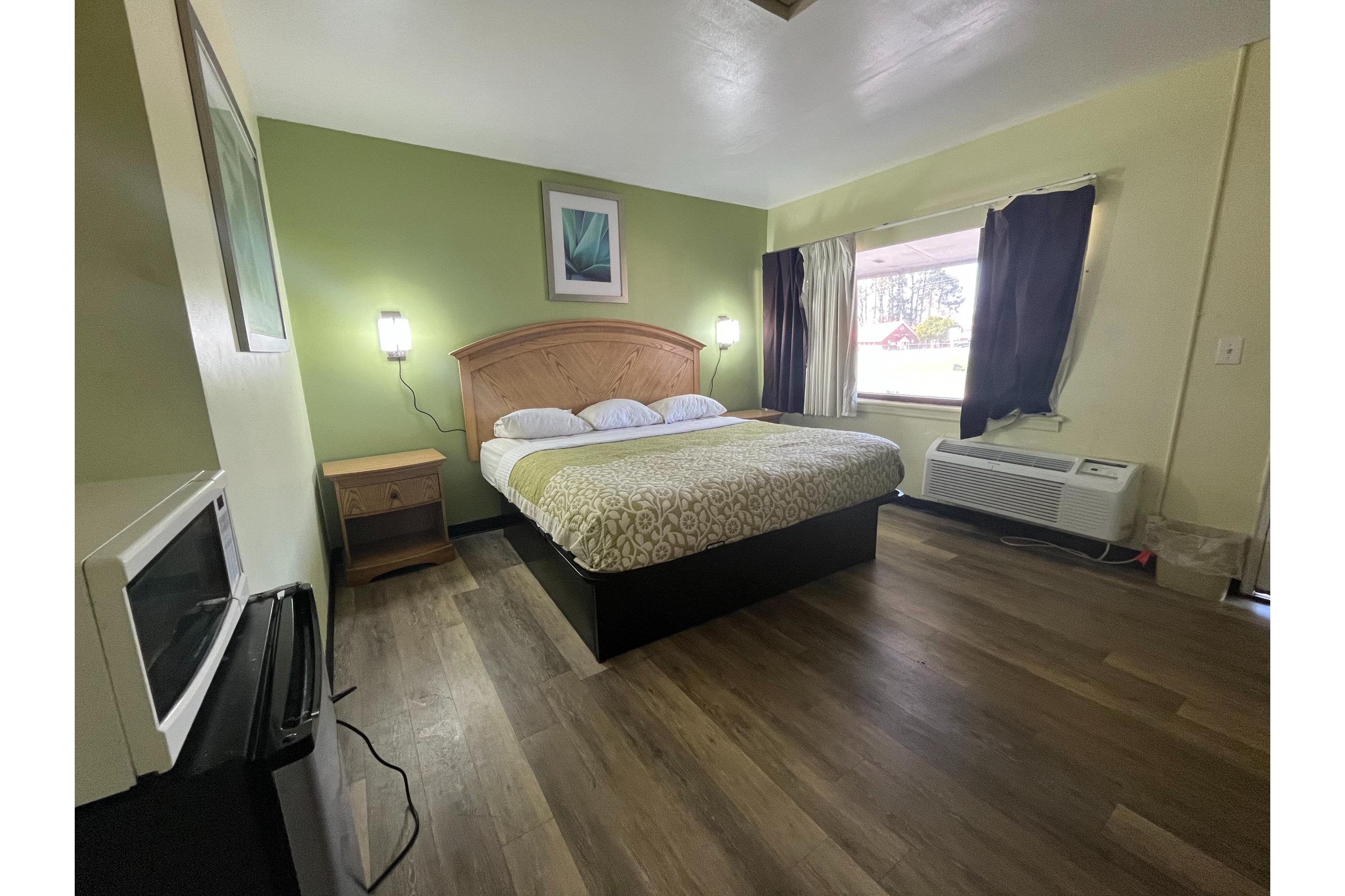 WASHINGTON MOTEL BY OYO-guestroom-Room.jpg