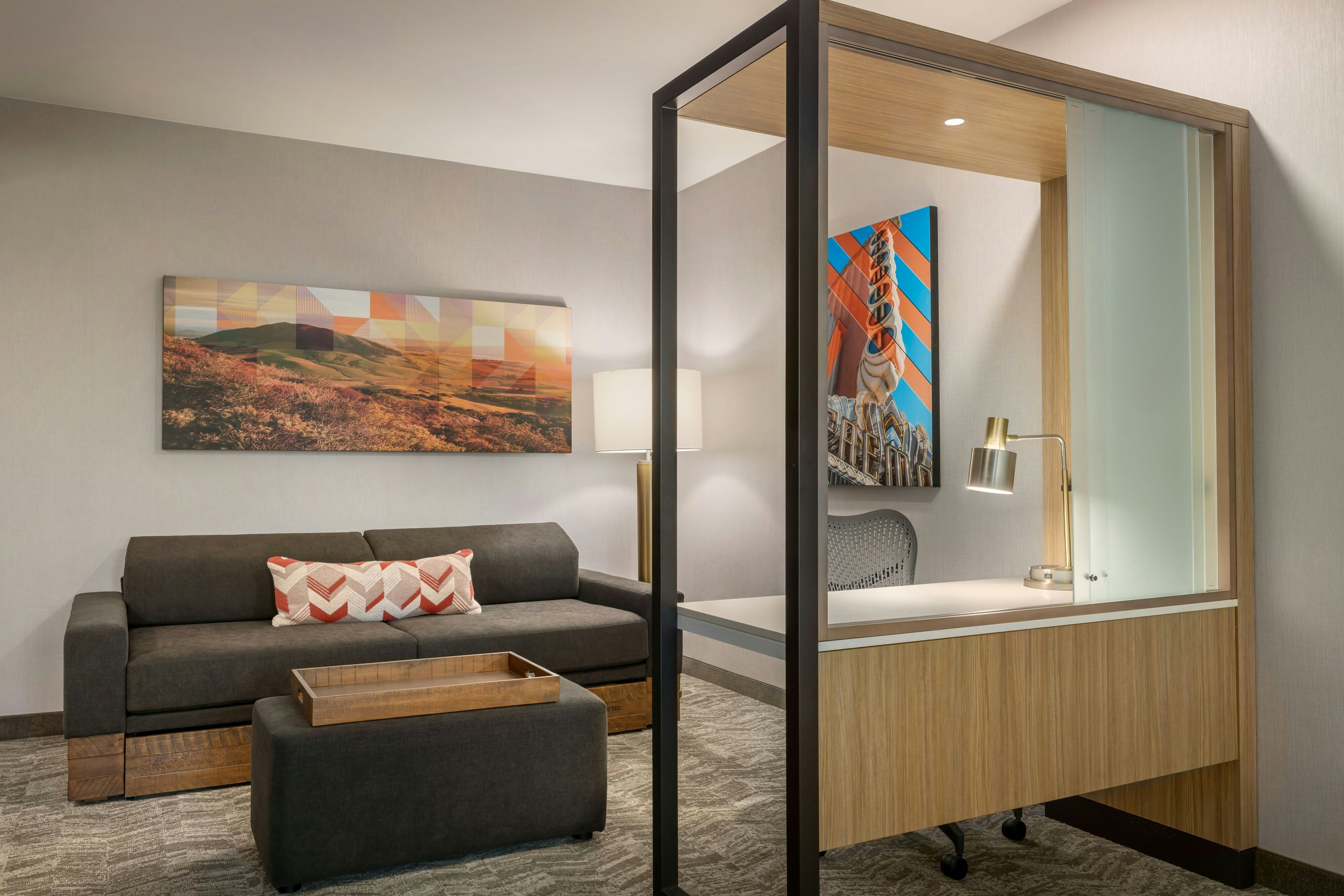 SpringHill Suites by Marriott San Luis Obispo-guestroom-Studio Suite Sofa and Desk Area.jpg