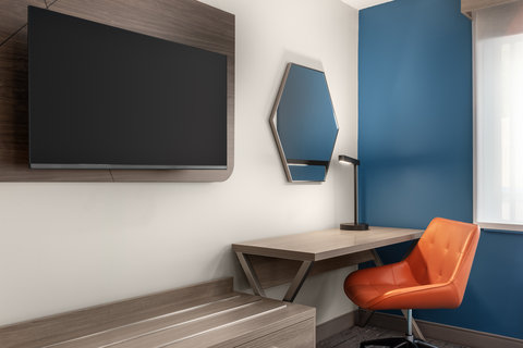 Rest easy in a room crafted with purpose and convenience.