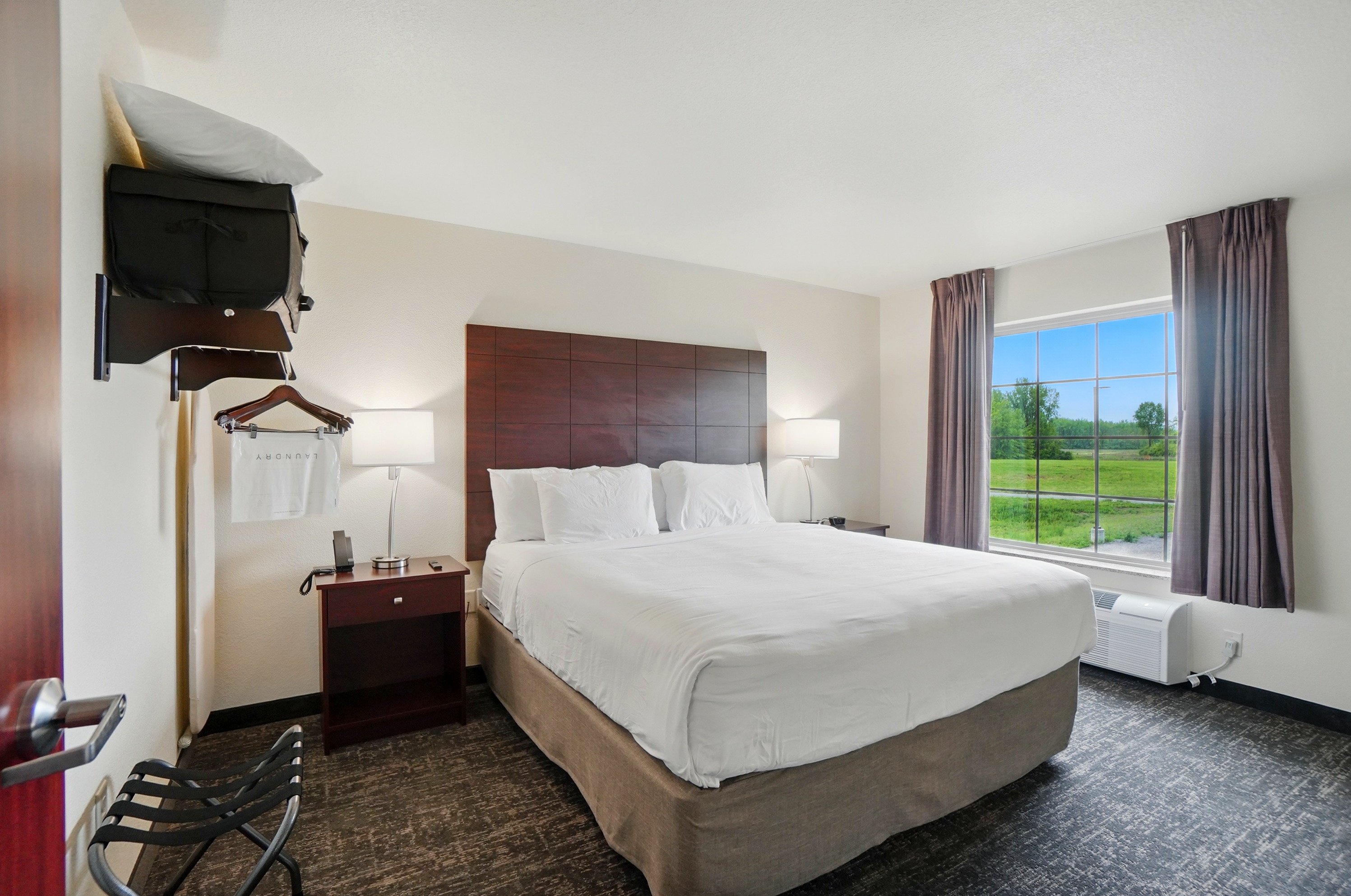 COBBLESTONE HOTEL AND SUITES-guestroom-Single King Extended Stay Suite.jpg