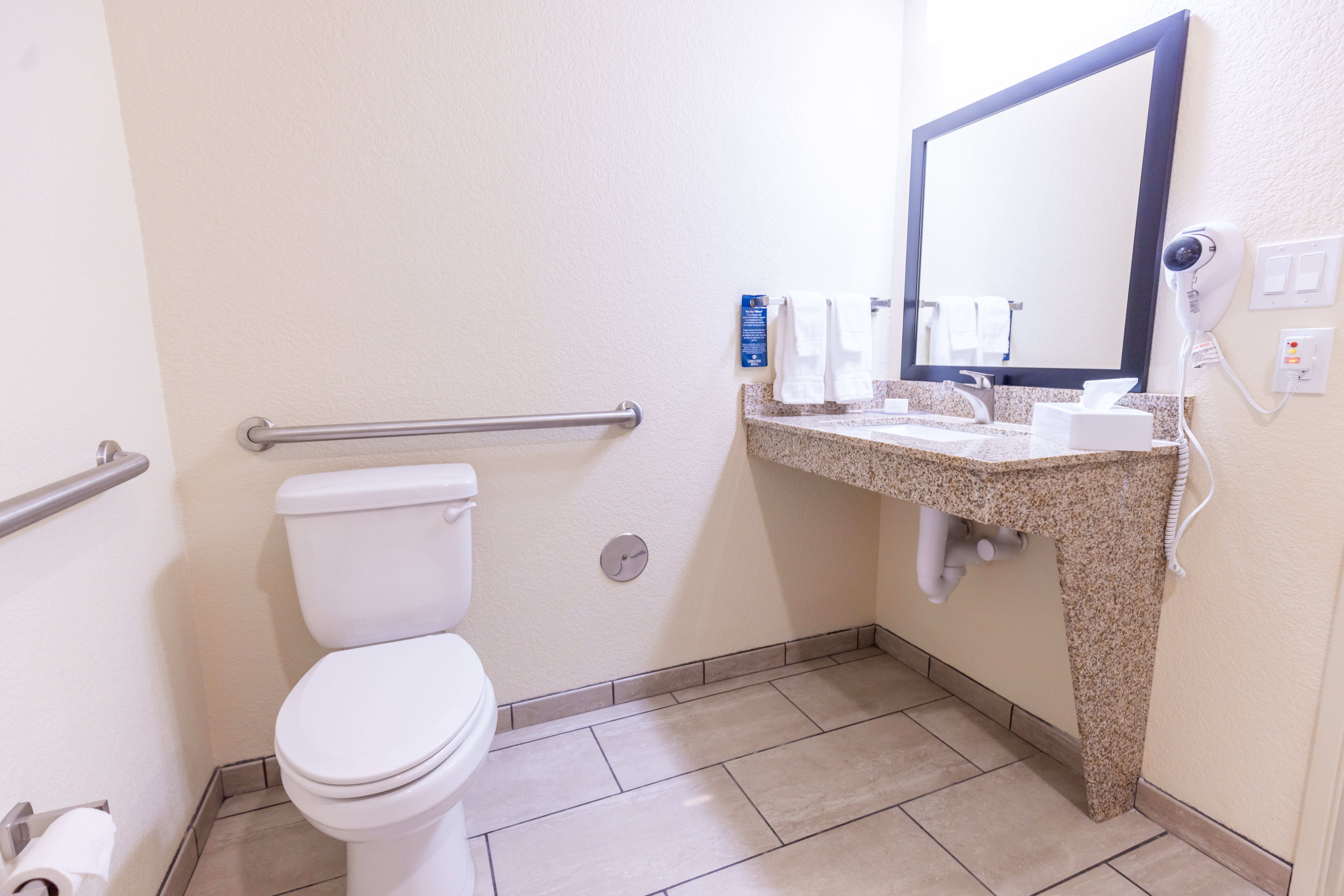 COBBLESTONE INN AND SUITES-guestroom-Accessible Bathroom With A Benched Tub.jpg