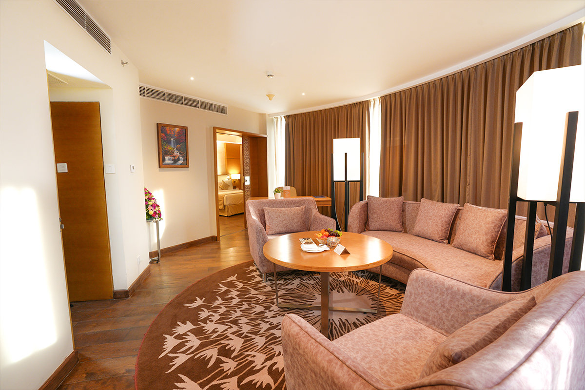 GOKULAM GRAND-guestroom-Suite Living Area.jpg