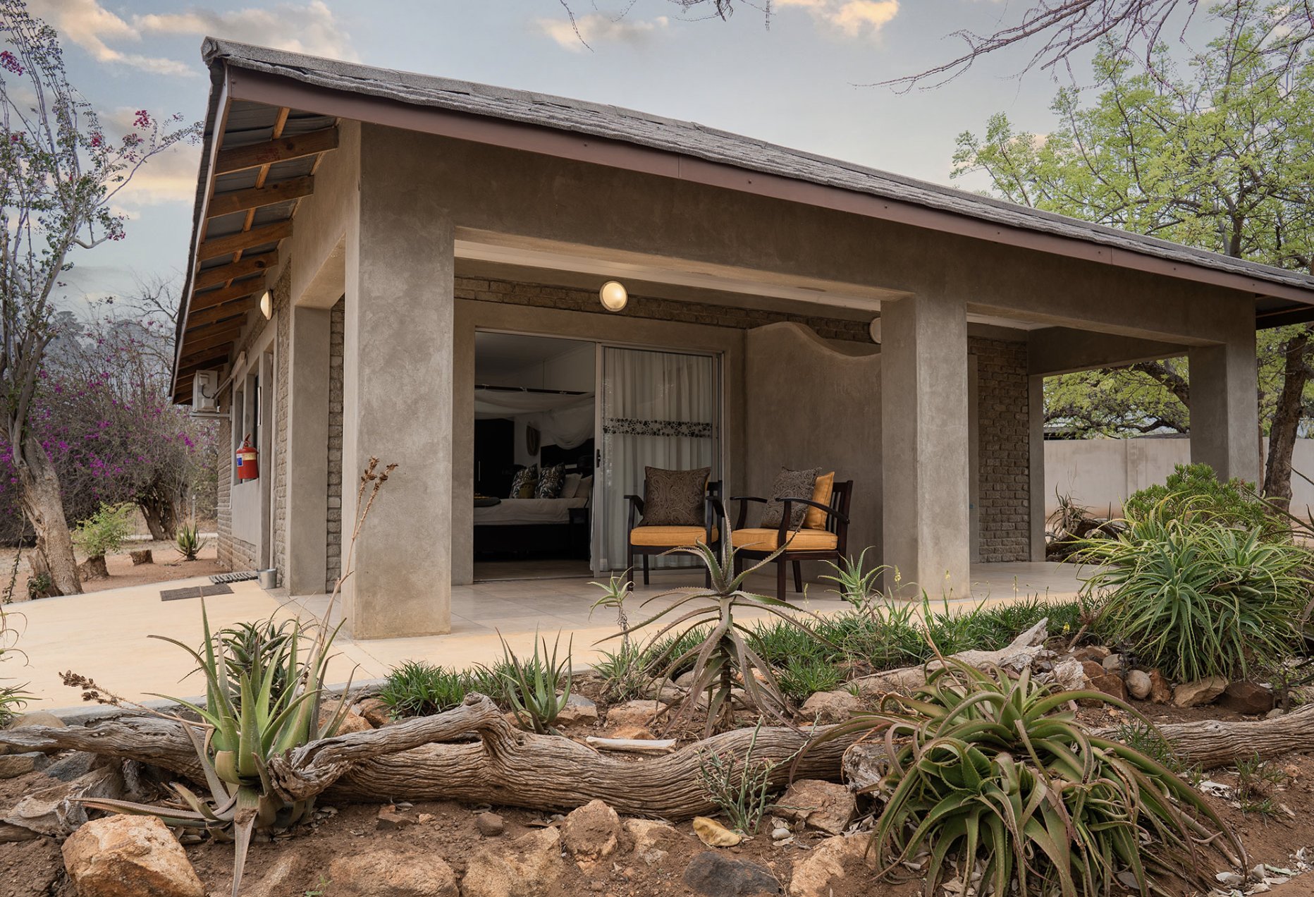 Tshukudu Game Lodge-guestroom-Deluxe Room.jpg