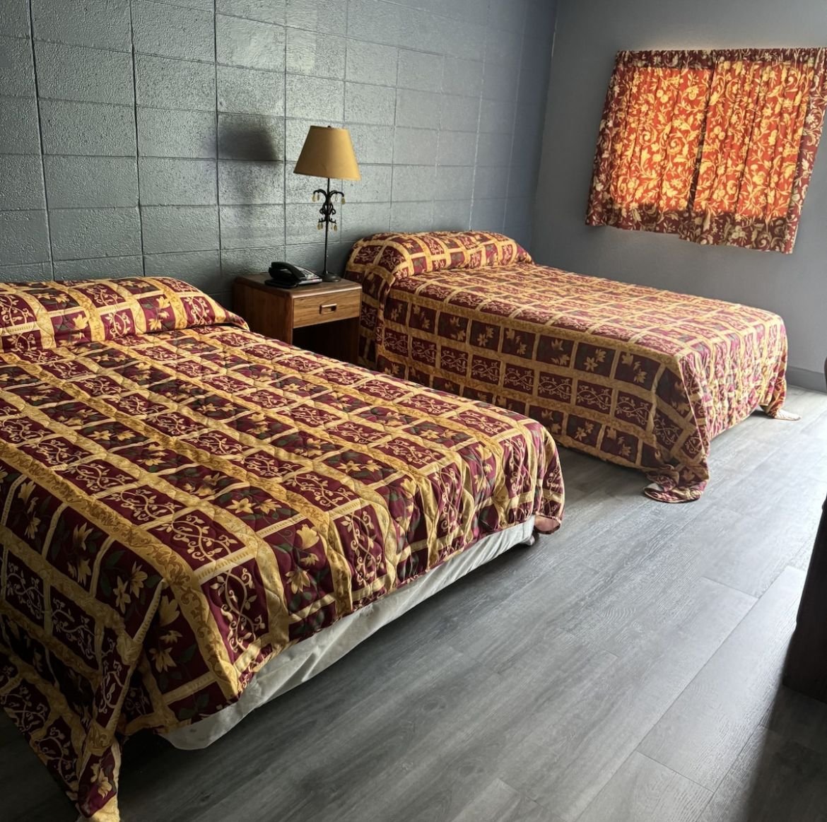 Capital O Clayton House Motel-guestroom-Room.jpg