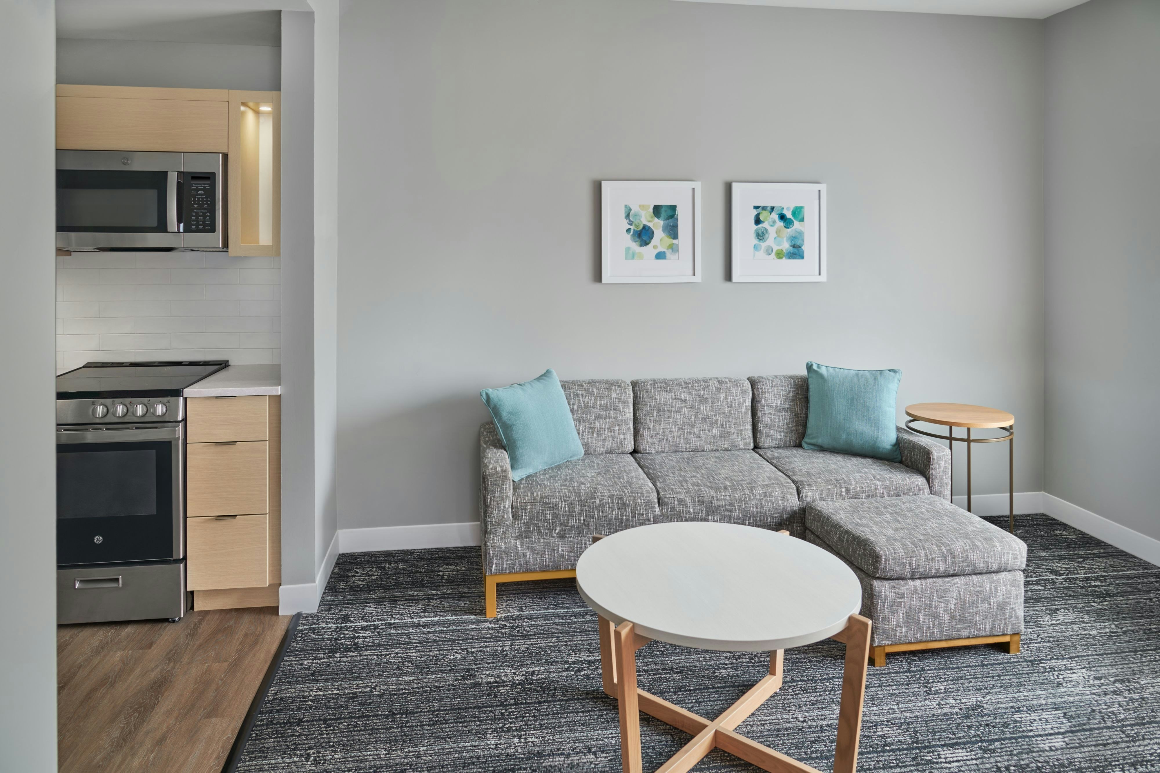 TownePlace Suites by Marriott Calhoun-guestroom-One Bedroom Suite - Living Room Seating.jpg