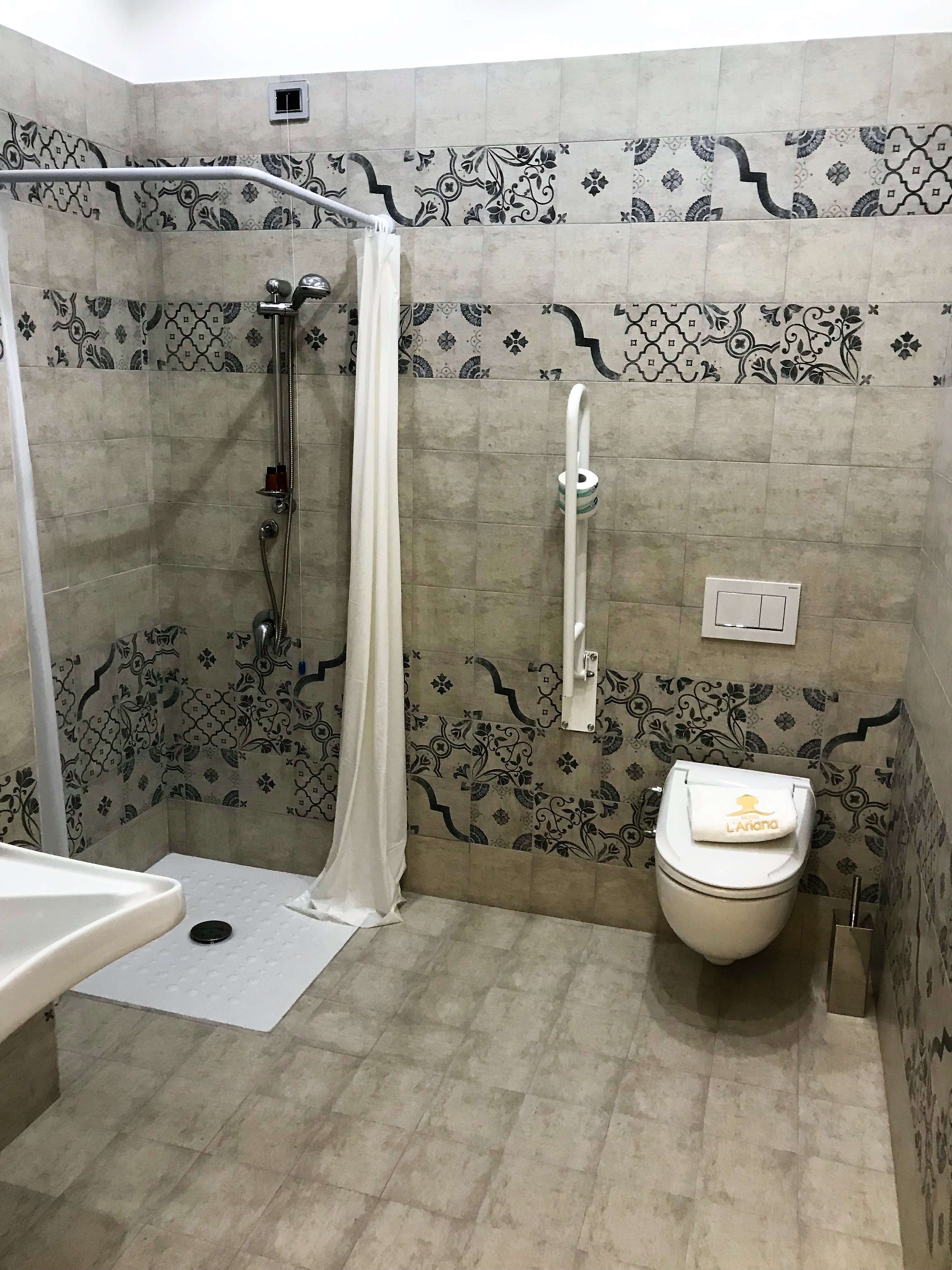 L Ariana Isole Eolie-guestroom-Standard Room Bathroom.jpg