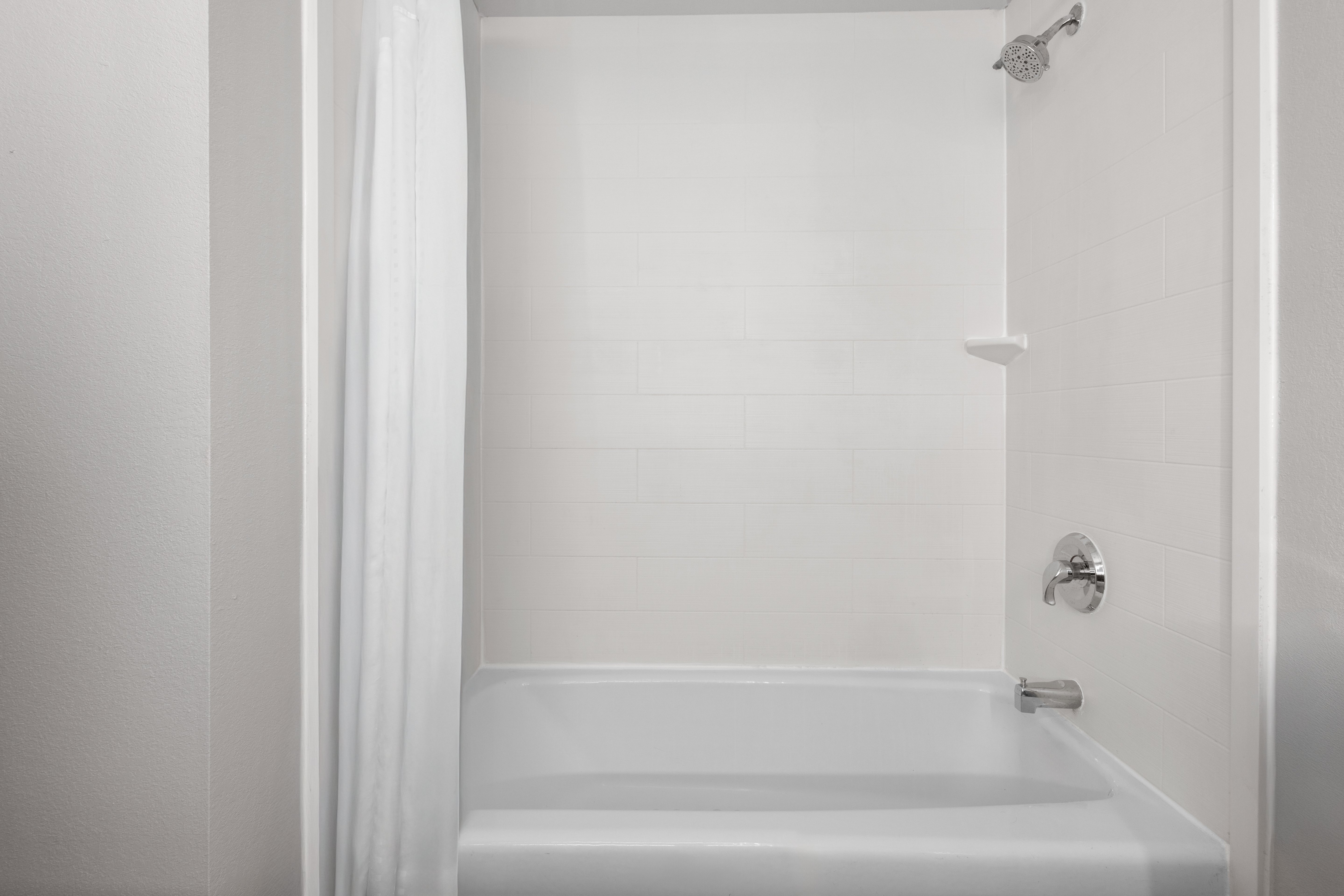 HOLIDAY INN TANGLEWOOD BY IHG-guestroom-Enjoy a nice relaxing soak in our tub. .jpg