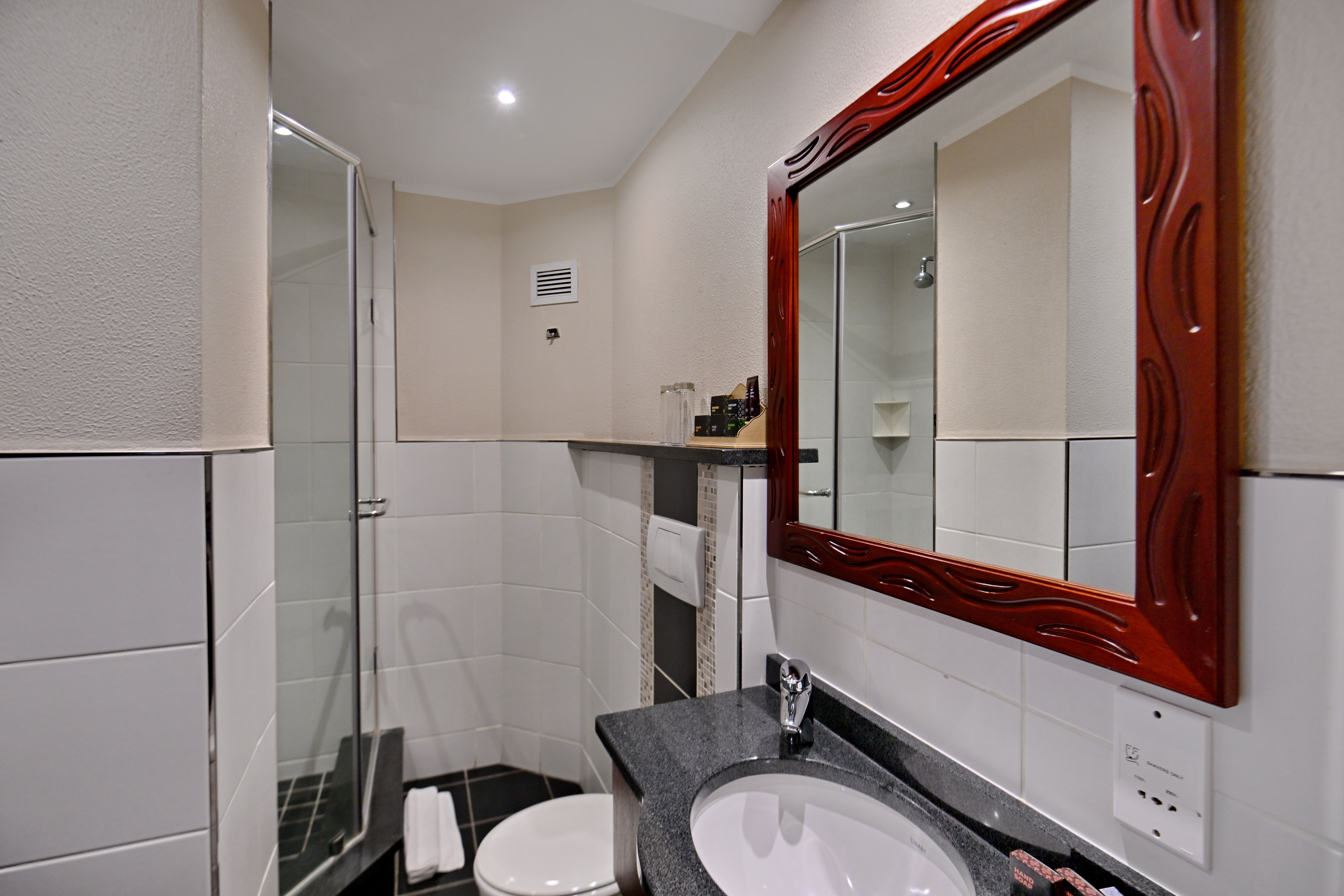 TOWN LODGE POLOKWANE-guestroom-Suite Sleeper Couch Closed.jpg