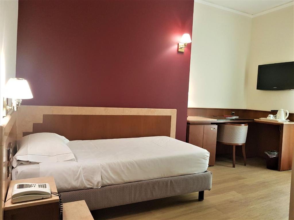 HOTEL ASTRA FERRARA-guestroom-GUEST ROOM.jpg