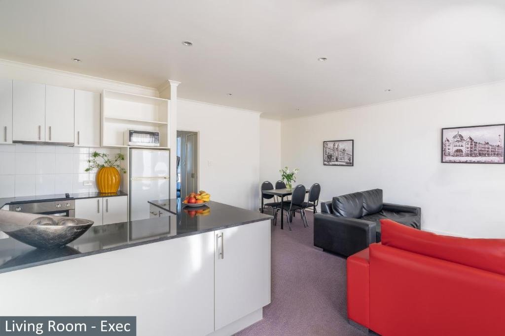 CLOCKTOWER APARTMENT HOTEL-guestroom-Clocktower Apartment Hotel Exe Living Room.jpg