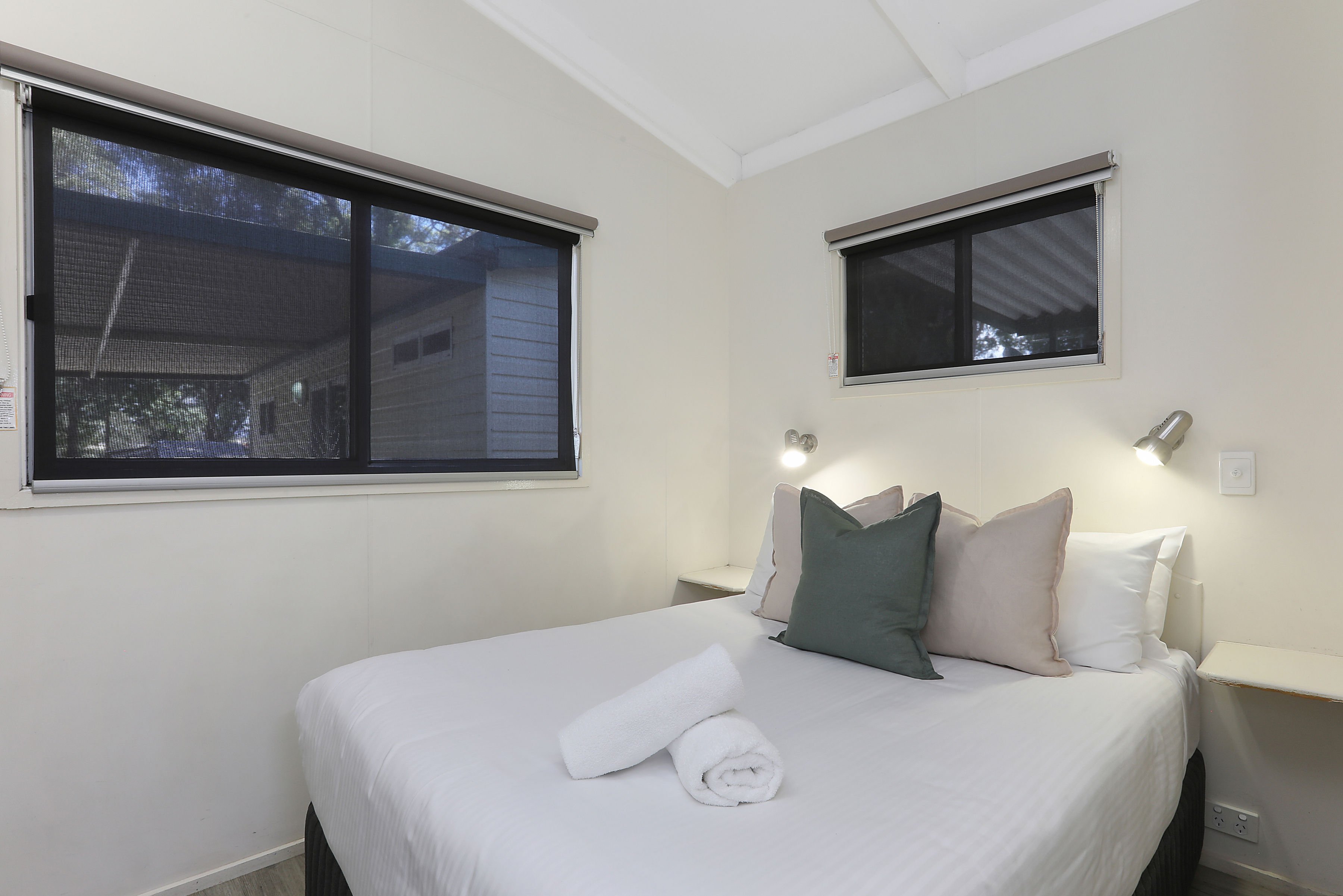 REFLECTIONS COFFS HARBOUR - HO-guestroom-CH Standard Sleeps Bed.jpg
