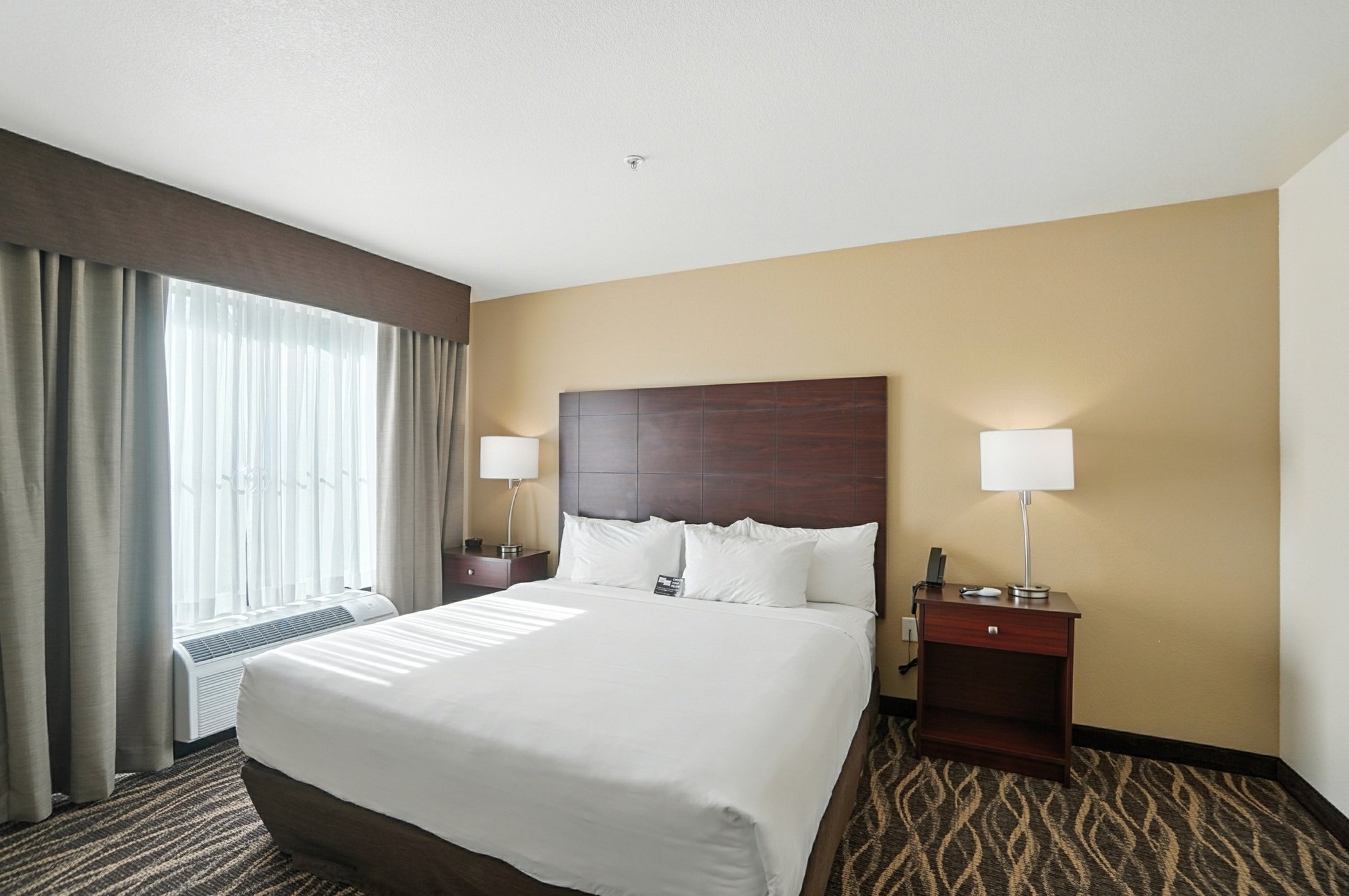 Cobblestone Bellefontaine-guestroom-Single King Extended Stay Suite.jpg