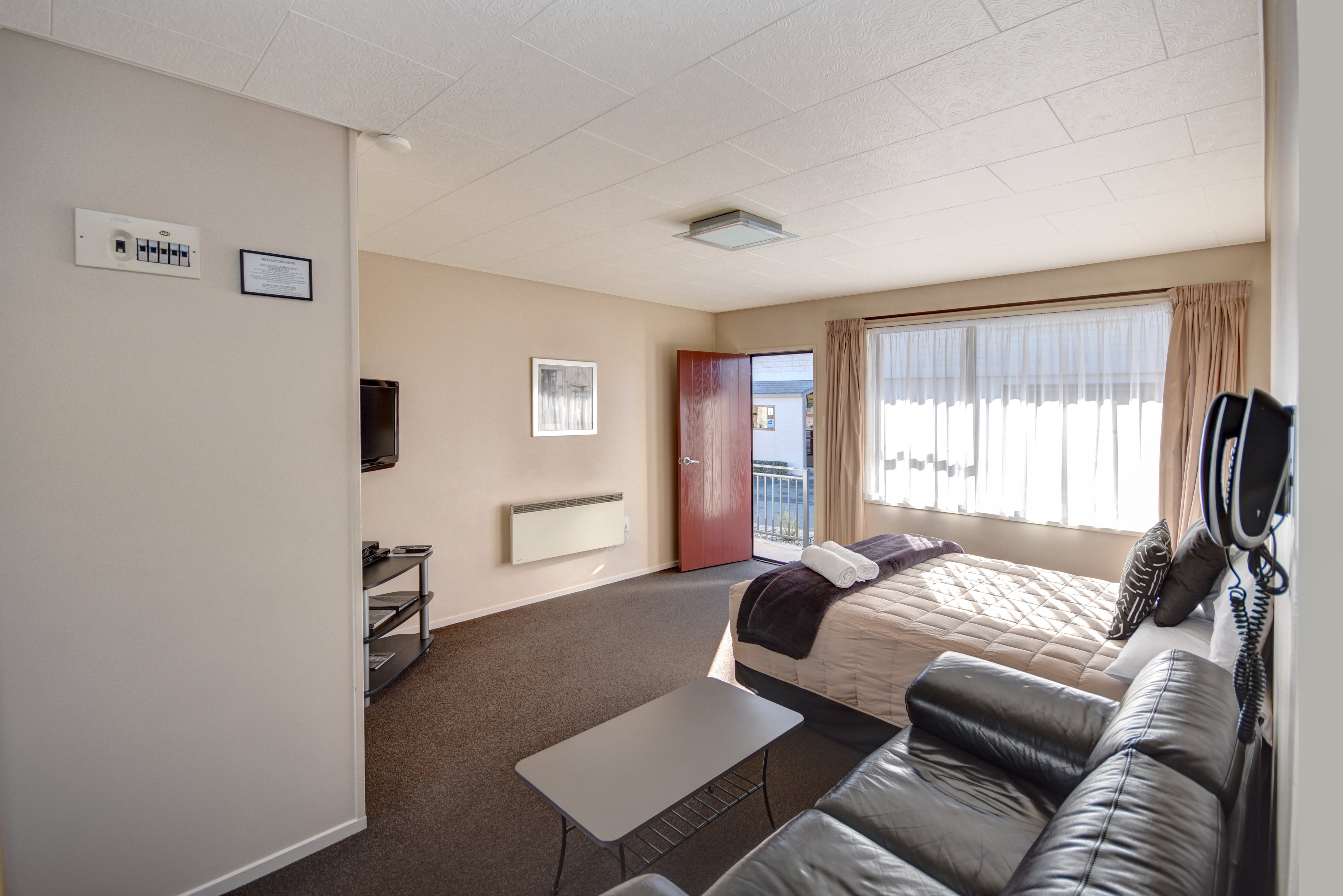 ASURE Adrian Motel-guestroom-One-Bedroom Apartment Bedroom.jpg