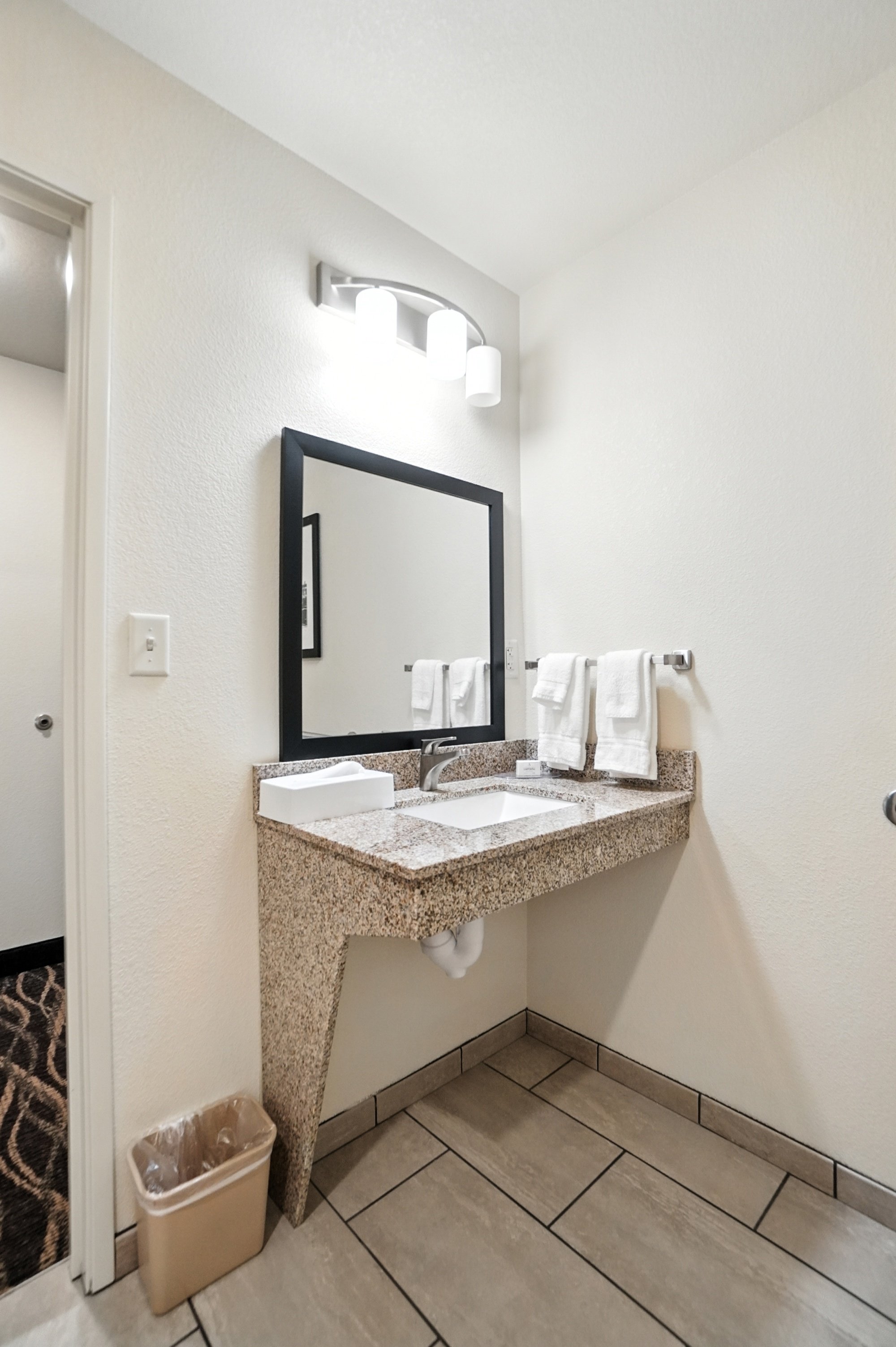 Cobblestone Bellefontaine-guestroom-Accessible Bathroom With A Roll-In Shower.jpg