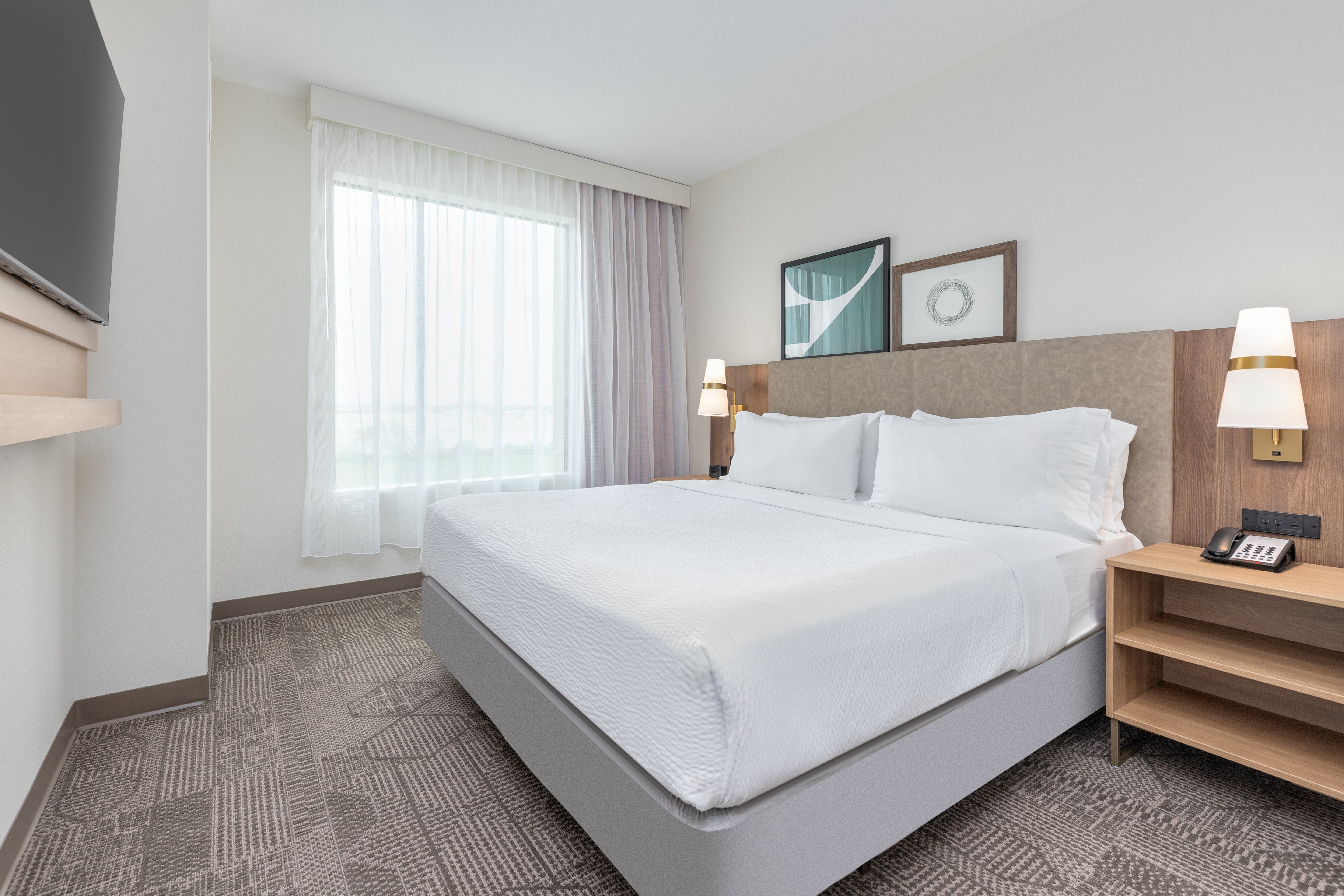 STAYBRIDGE STES PORT ARTHUR BY IHG-guestroom-Retreat to a private bedroom built for total comfort..jpg
