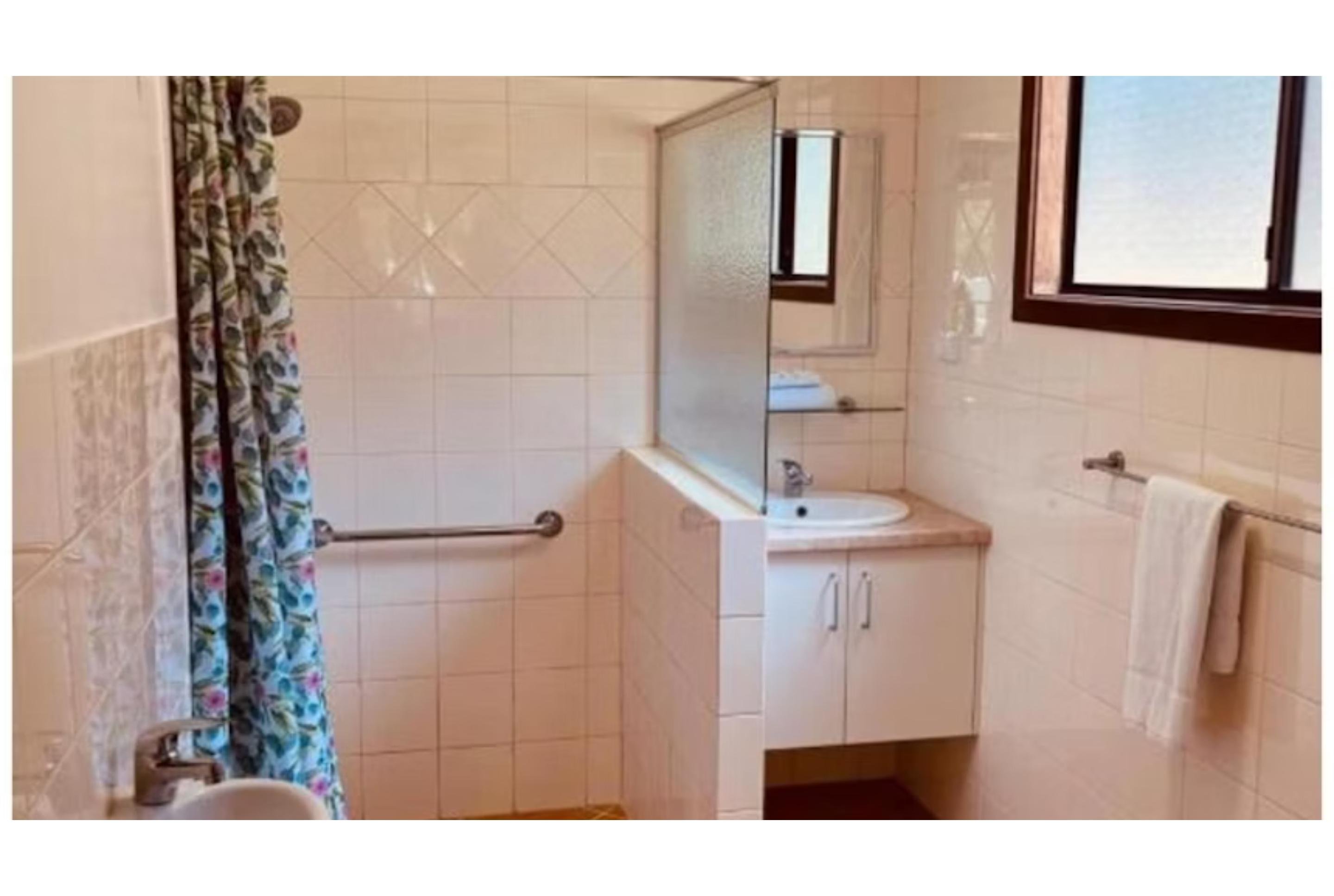 DISCOVERY PARKS - MARGARET RIV-guestroom-Discovery Parks Margaret River Standard Bedroom Cabin Bathroom.jpg
