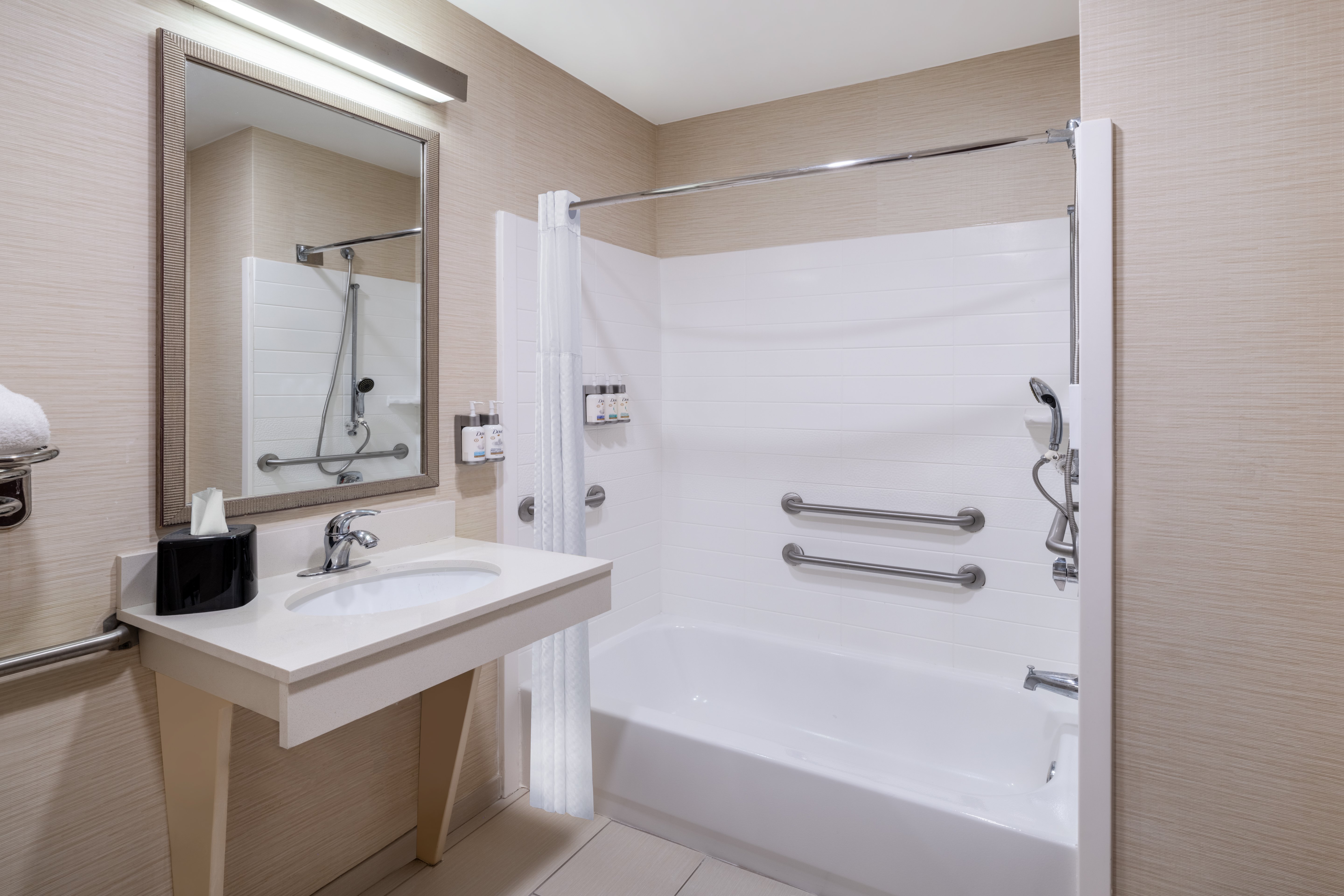 GARNER HOTEL WEST BY IHG-guestroom-Accessibility features include bathtub with grab bars..jpg