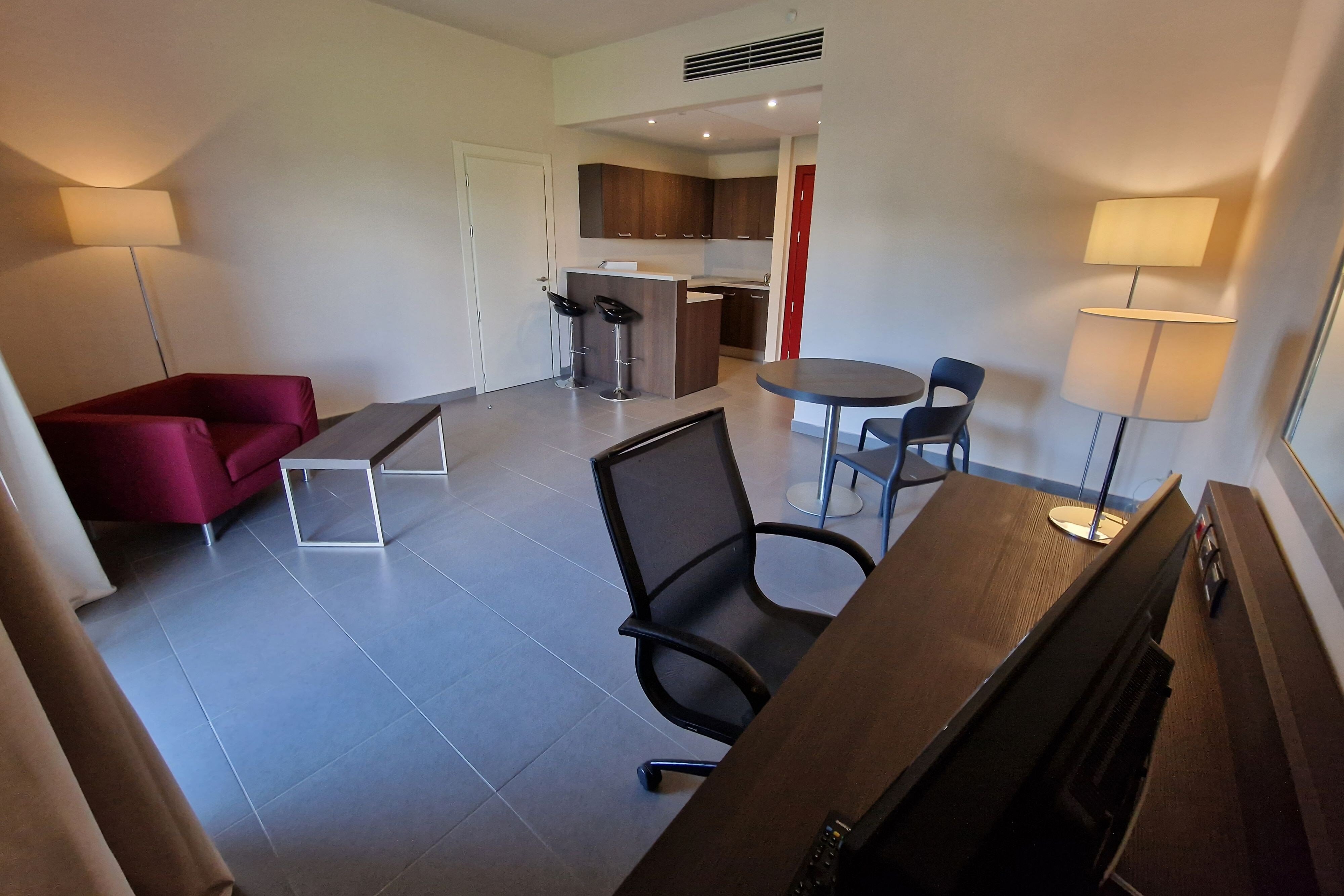 Inn Naples Airport-guestroom-Suite Room with King Bed.jpg