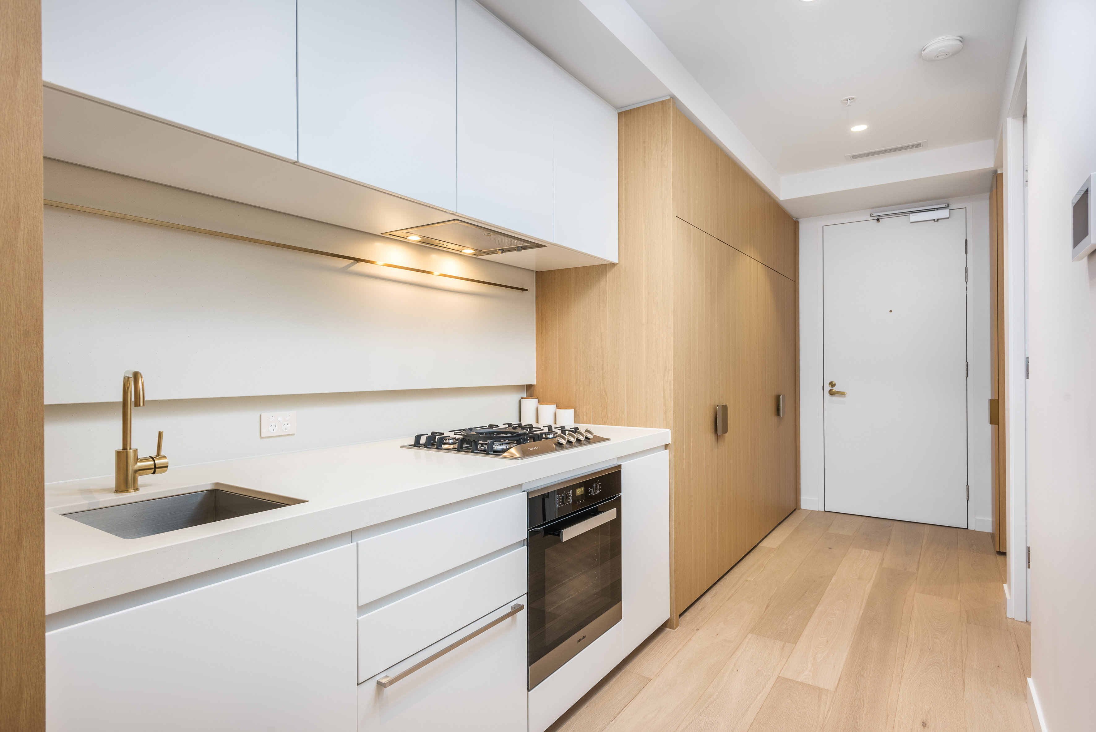 Sky One Apartments by CLLIX-guestroom-1 Bedroom Apartment- Kitchen.jpg