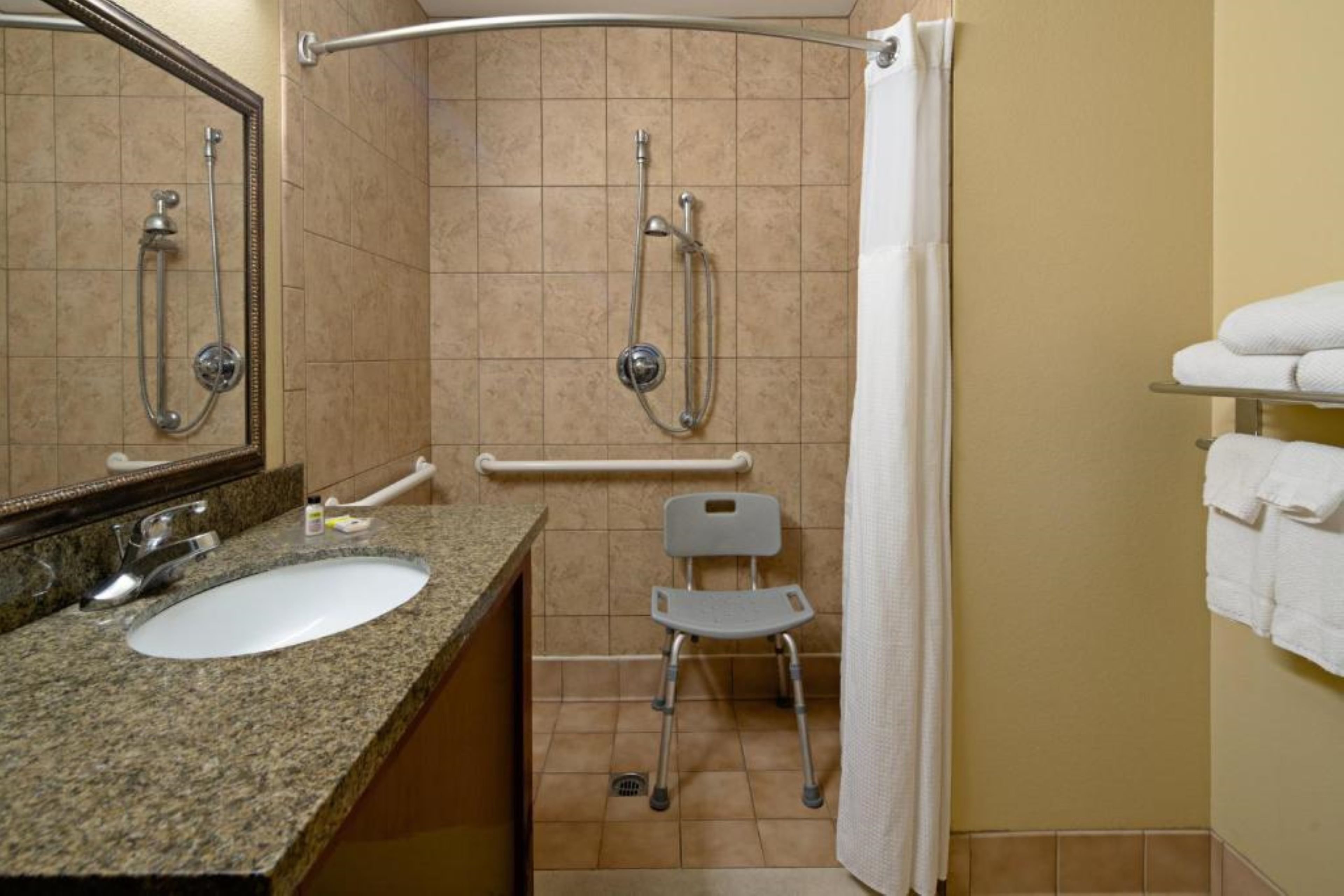STAYBRIDGE STES PALMDALE BY IHG-guestroom-Wheelchair Accessible Roll In Shower.jpg