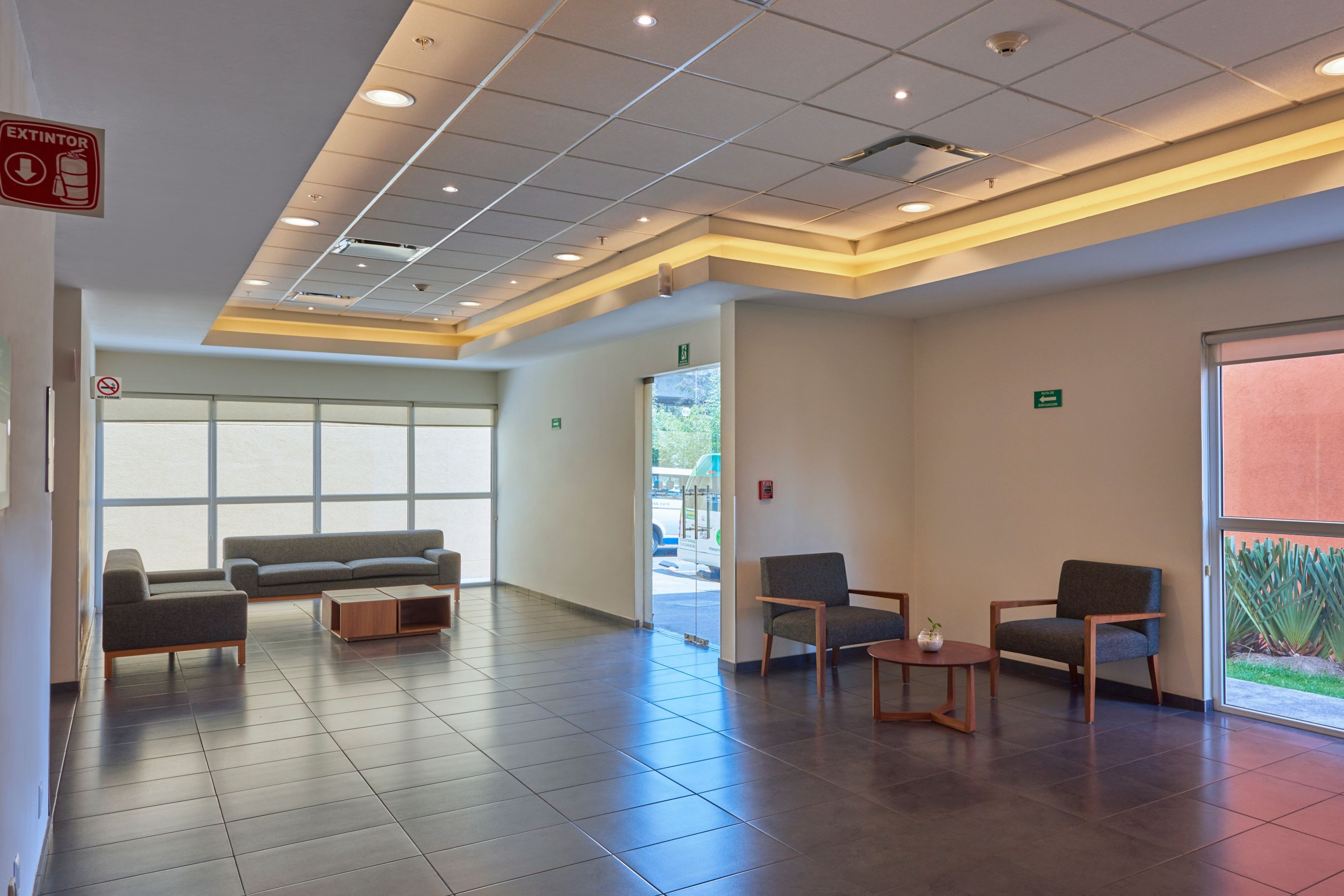 City Express Junior by Marriott Puebla Finsa-guestroom-Living Area.jpg