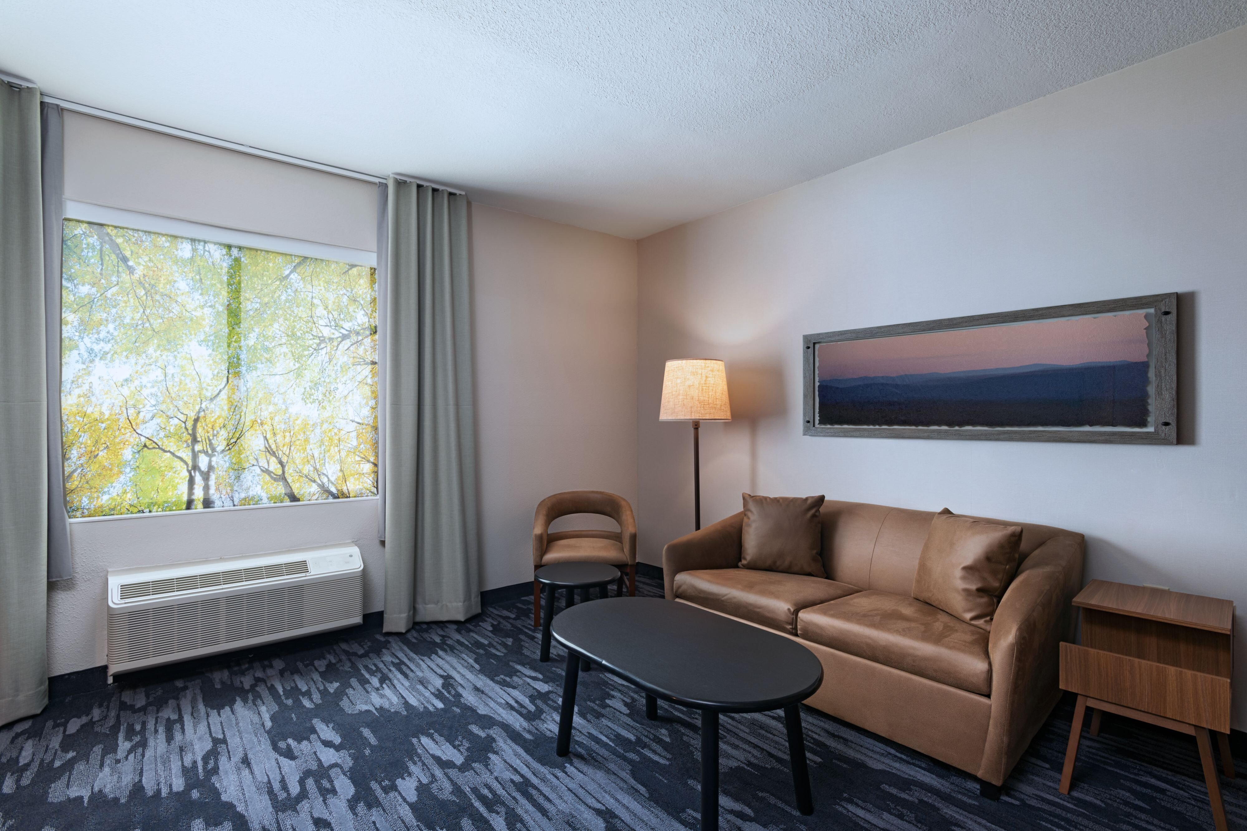 Fairfield by Marriott Inn and Suites Hillsboro-guestroom-King Suite Sitting Area.jpg