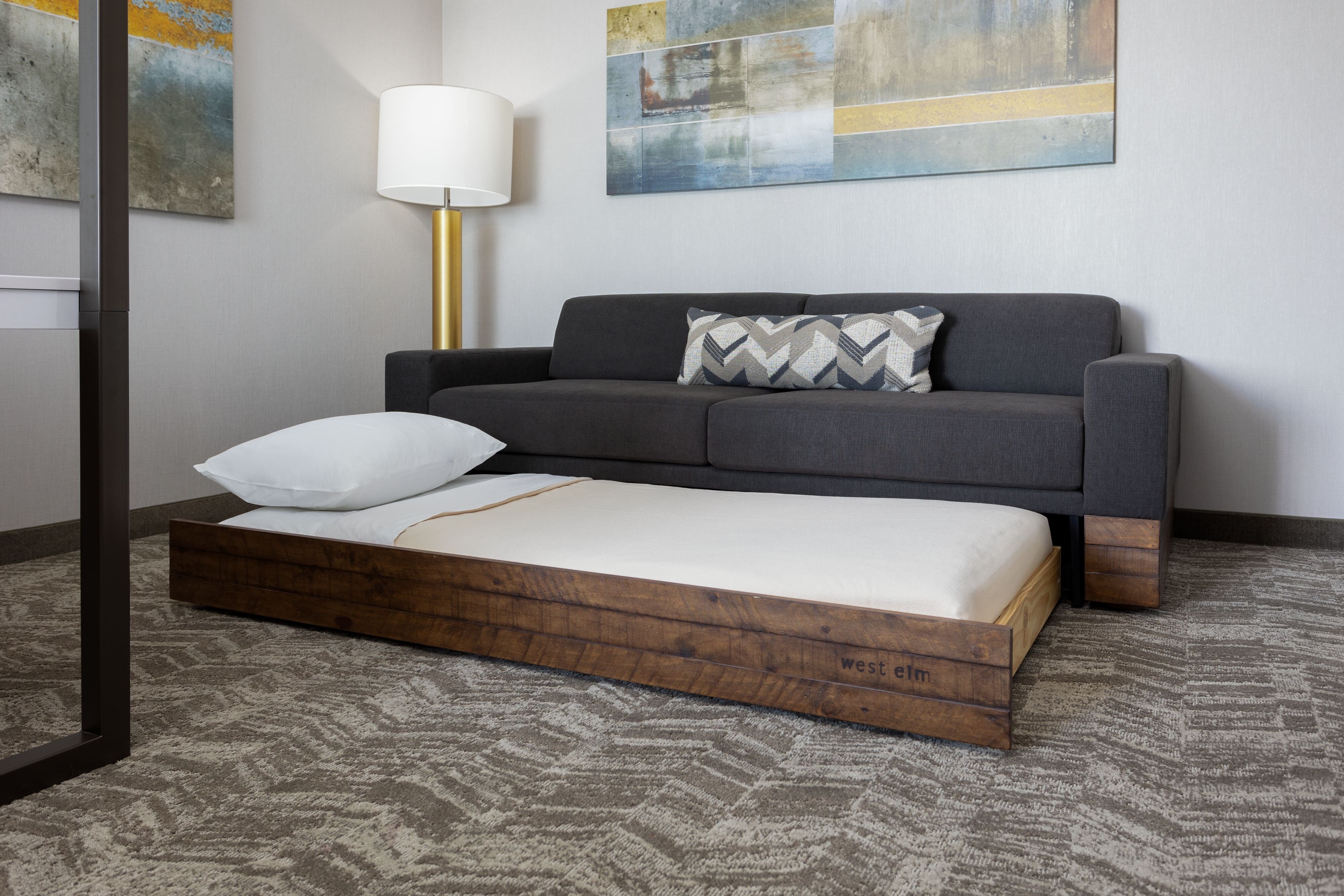 SpringHill Suites by Marriott Pleasanton-guestroom-West Elm Trundle Sofa Bed.jpg
