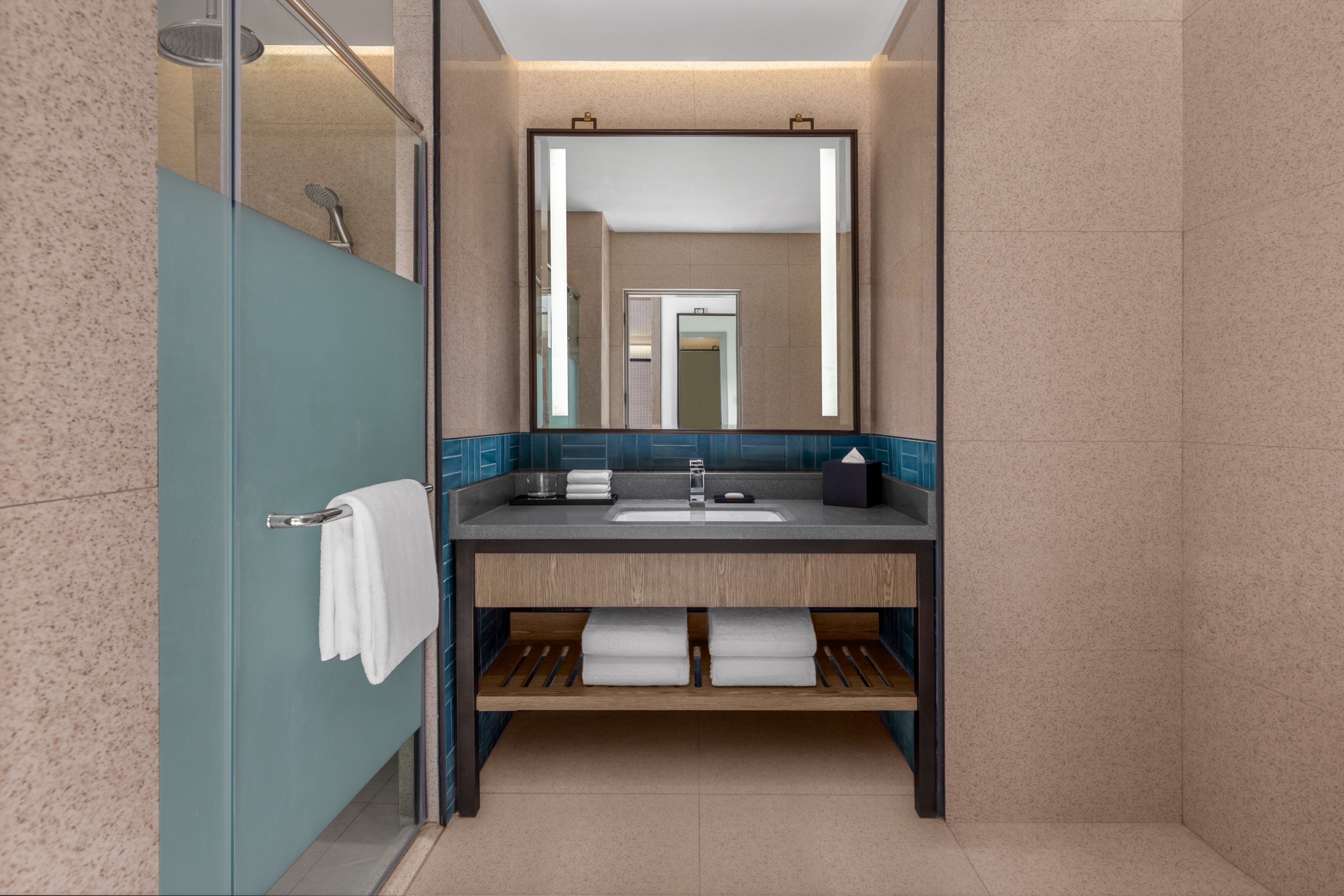 Four Points by Sherton Palawan Puerto Princesa-guestroom-Deluxe Bathroom with Shower and Sink.jpg