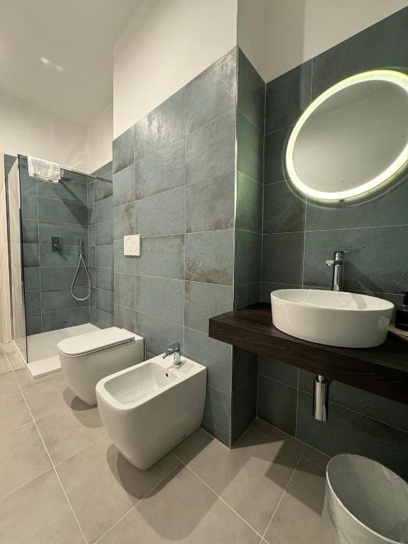 VILLA ANGELA SUITES-guestroom-BATH ROOM.jpg