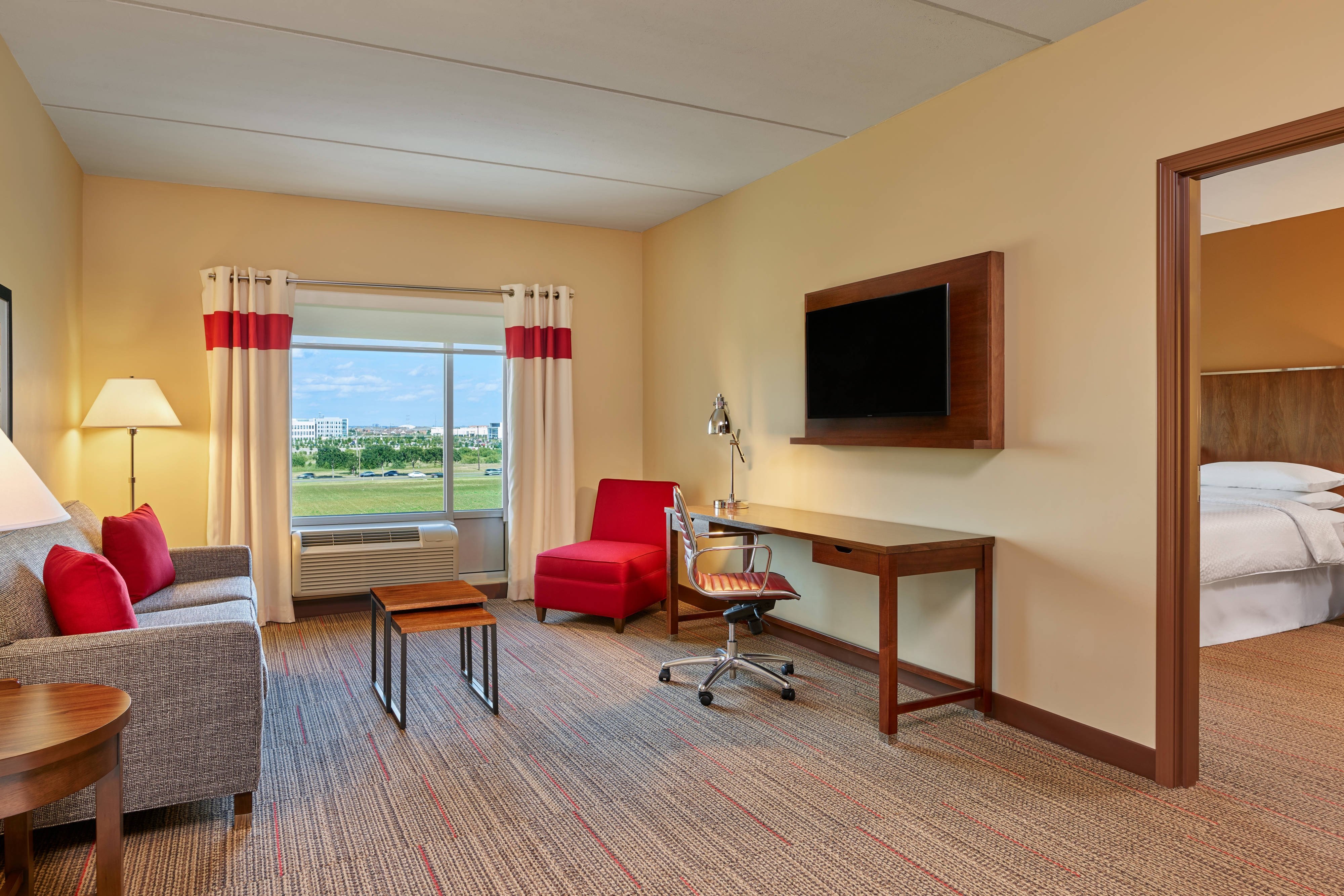 Four Points by Sheraton Dallas Fort Worth Airport North-guestroom-King One-Bedroom Suite.jpg