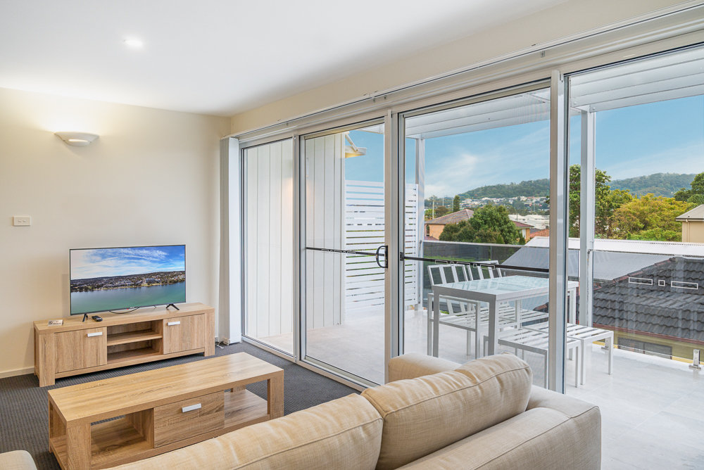 THE WARNERS BAY APARTMENTS-guestroom-Albert St Bedroom Apartments Warners Bay Kb Copyright Andrew Toogood Newcastle.jpg