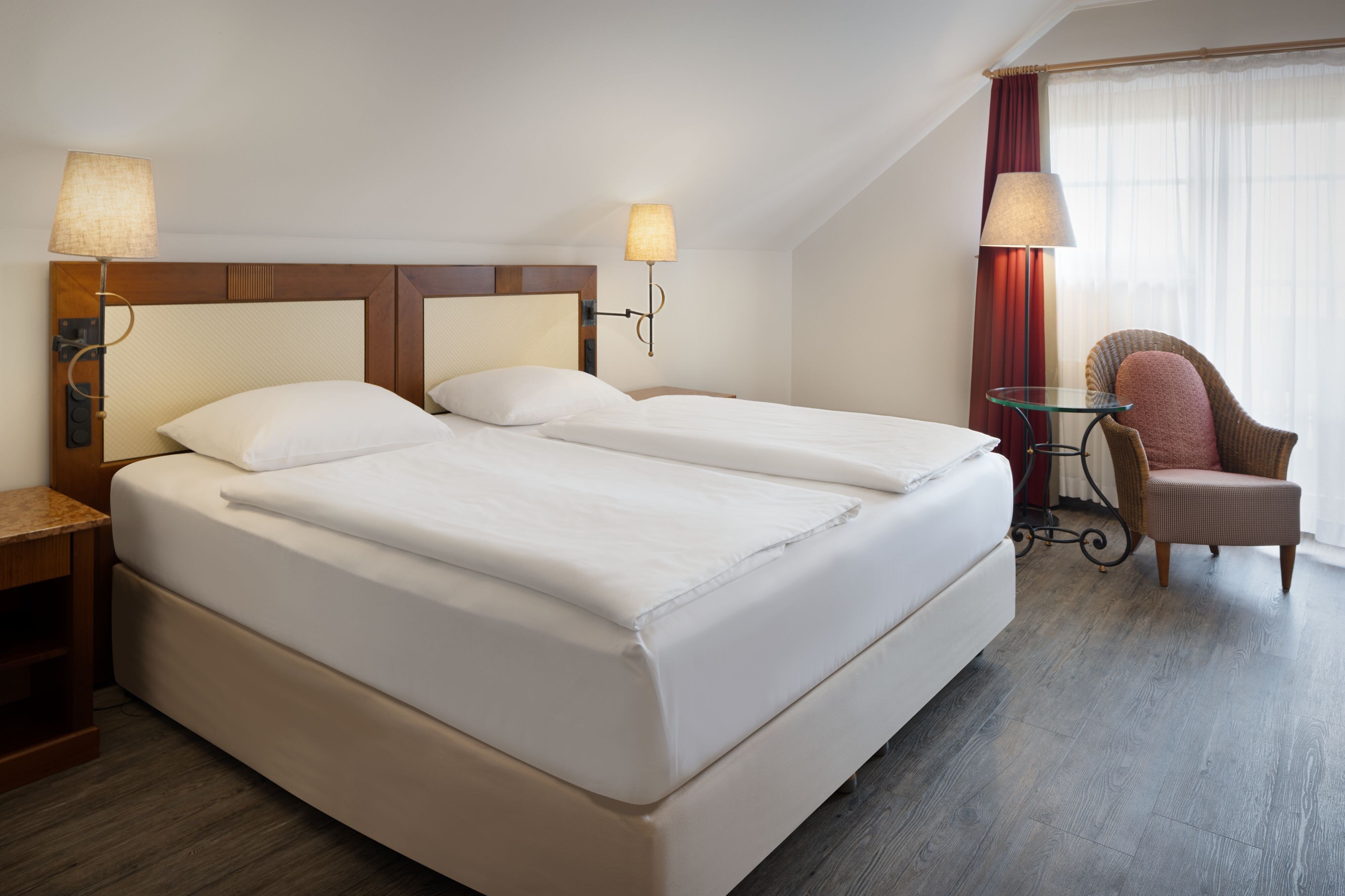 Arabella Jagdhof Resort am Fuschlsee a Tribute Portfolio Hotel-guestroom-Suite bedroom.jpg