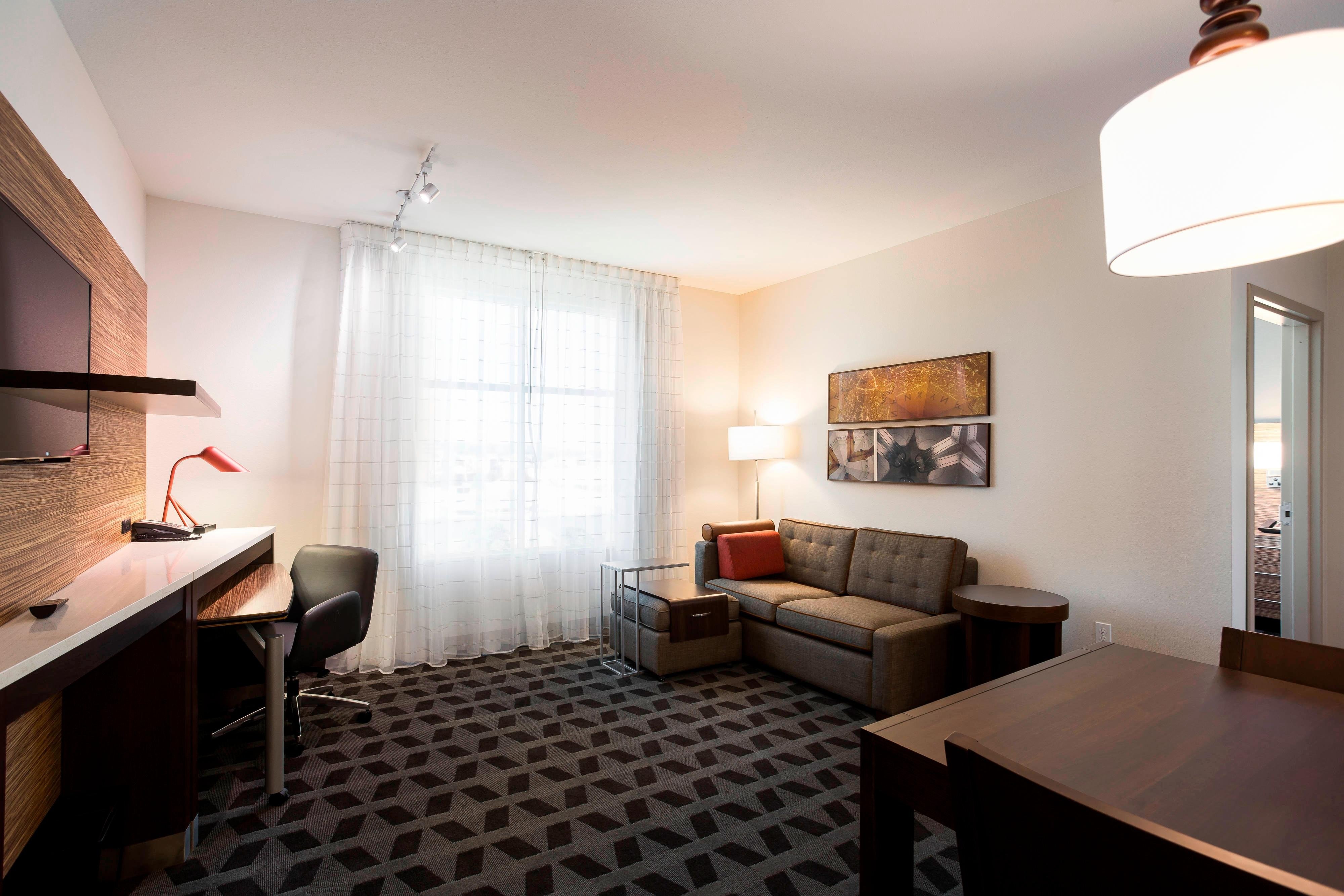 TownePlace Suites by Marriott San Mateo Foster City-guestroom-One-Bedroom Suite - Living Area.jpg