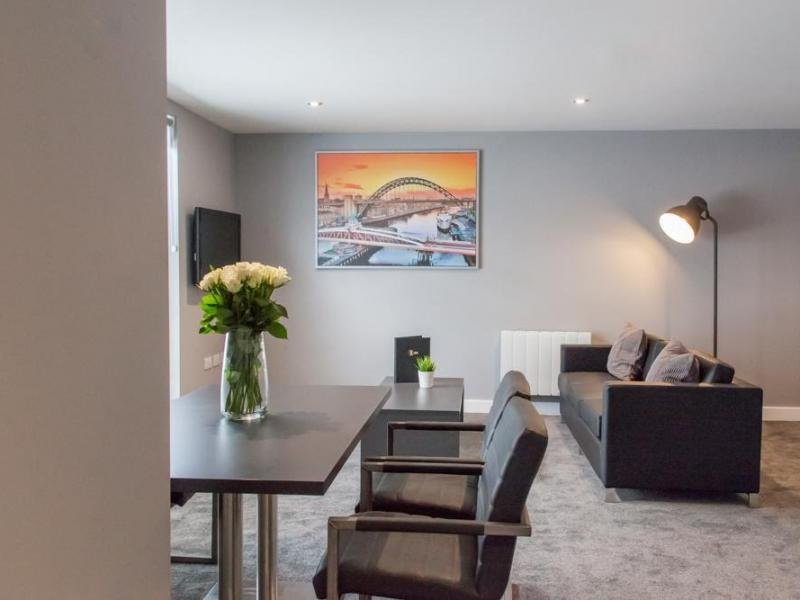 DREAM APARTMENTS AT AERIAL-guestroom-Three Bedroom Apartment Living Area.jpg