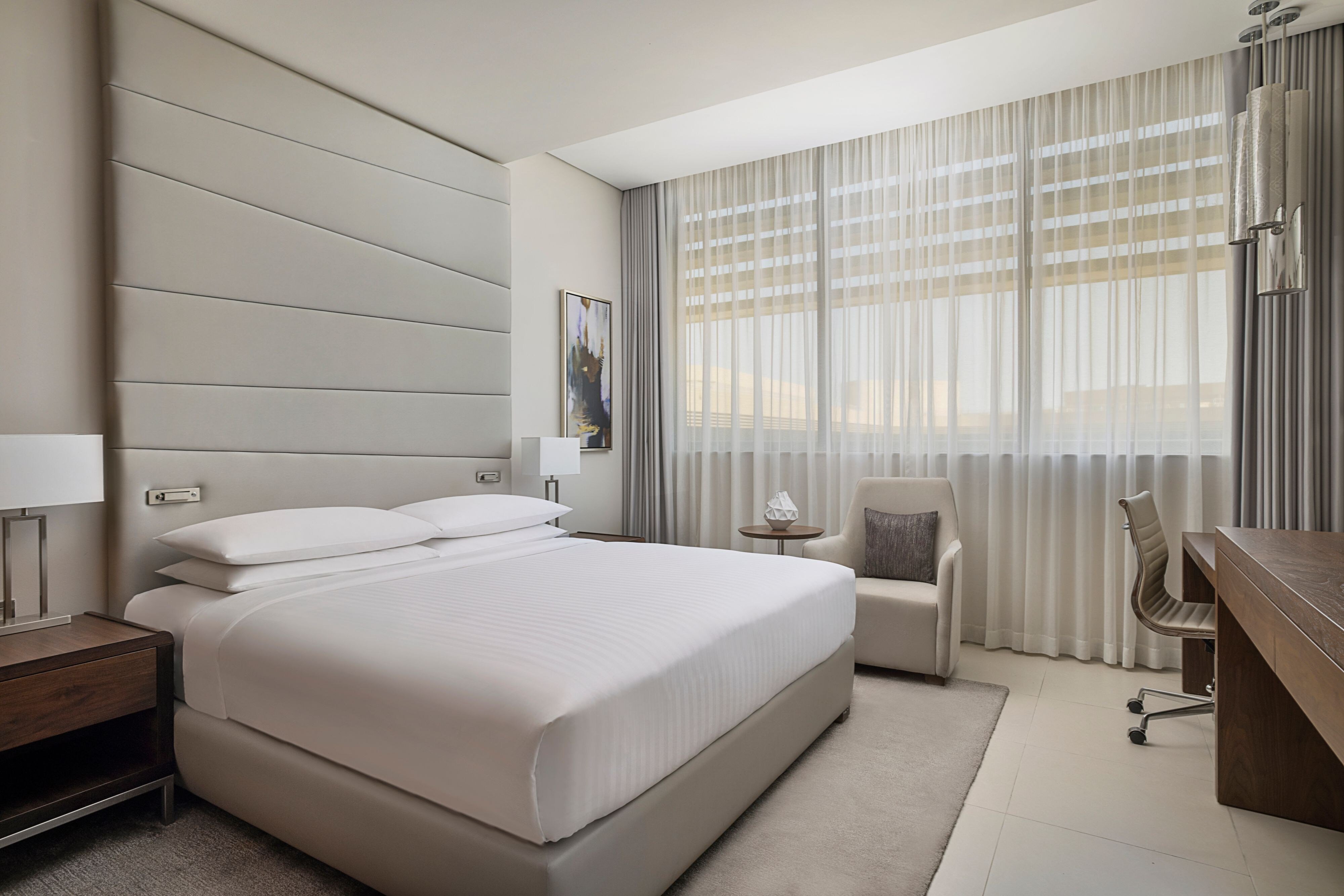 Riyadh Diplomatic Quarter - Marriott Executive Apartments-guestroom-Deluxe Room - King Bedroom.jpg