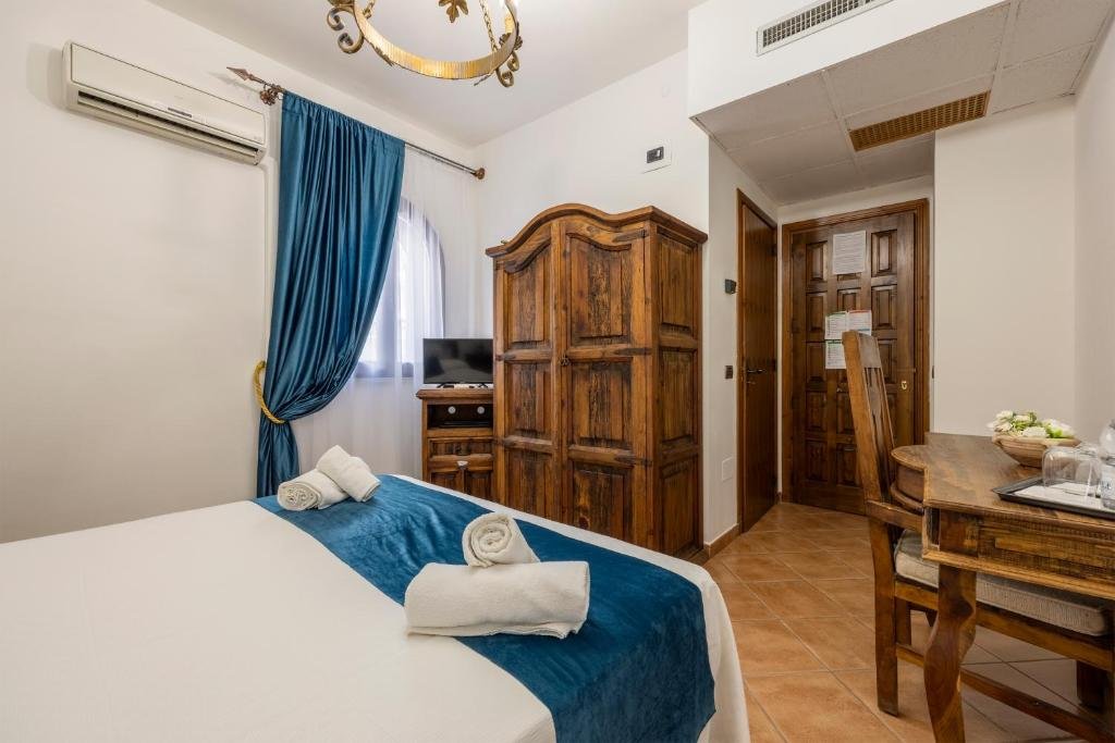 HOTEL CASTELLO DI GIULIANO-guestroom-Guest room.jpg
