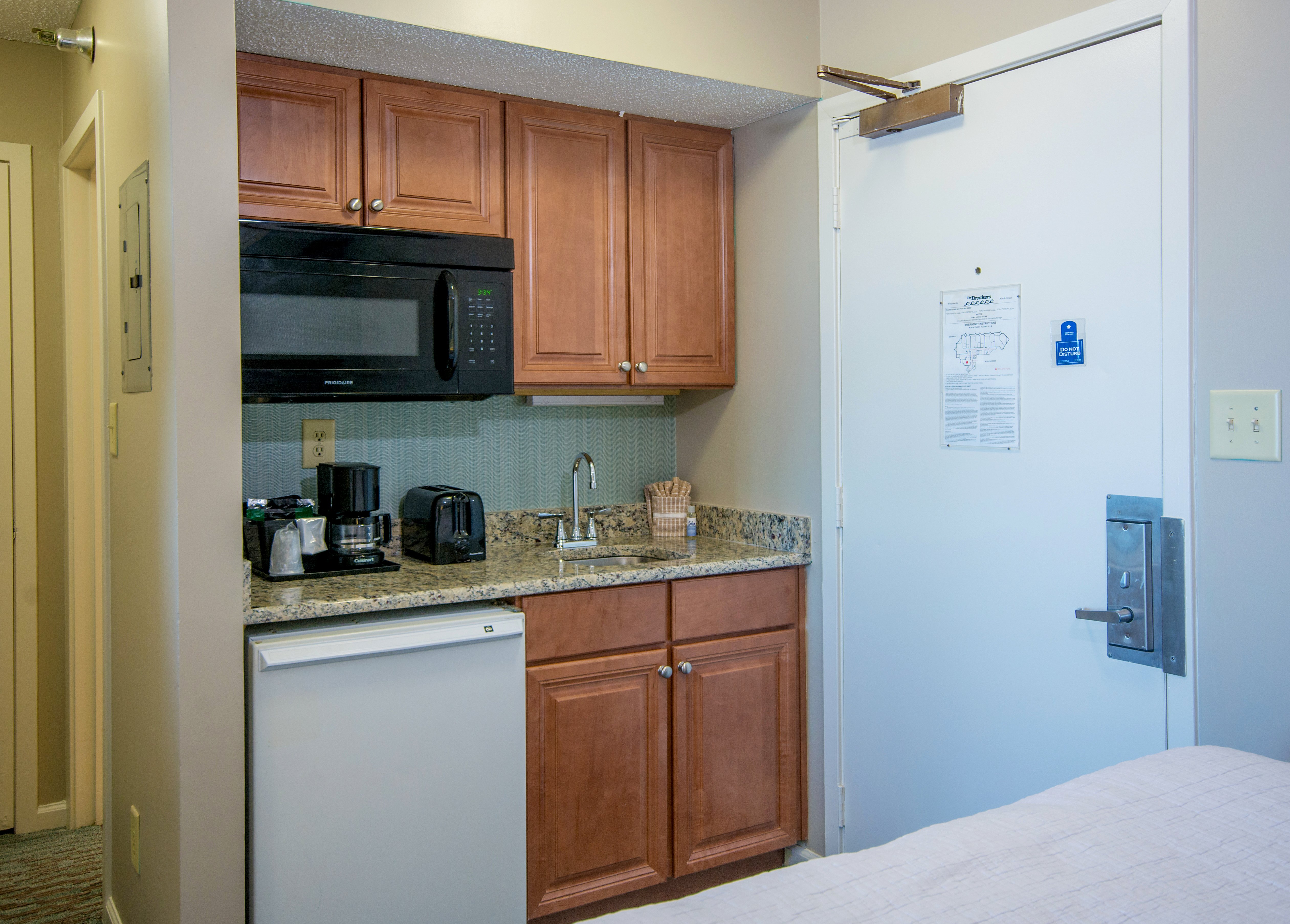 The Strand-guestroom-the strand b ocean view deluxe room kitchen ().jpg