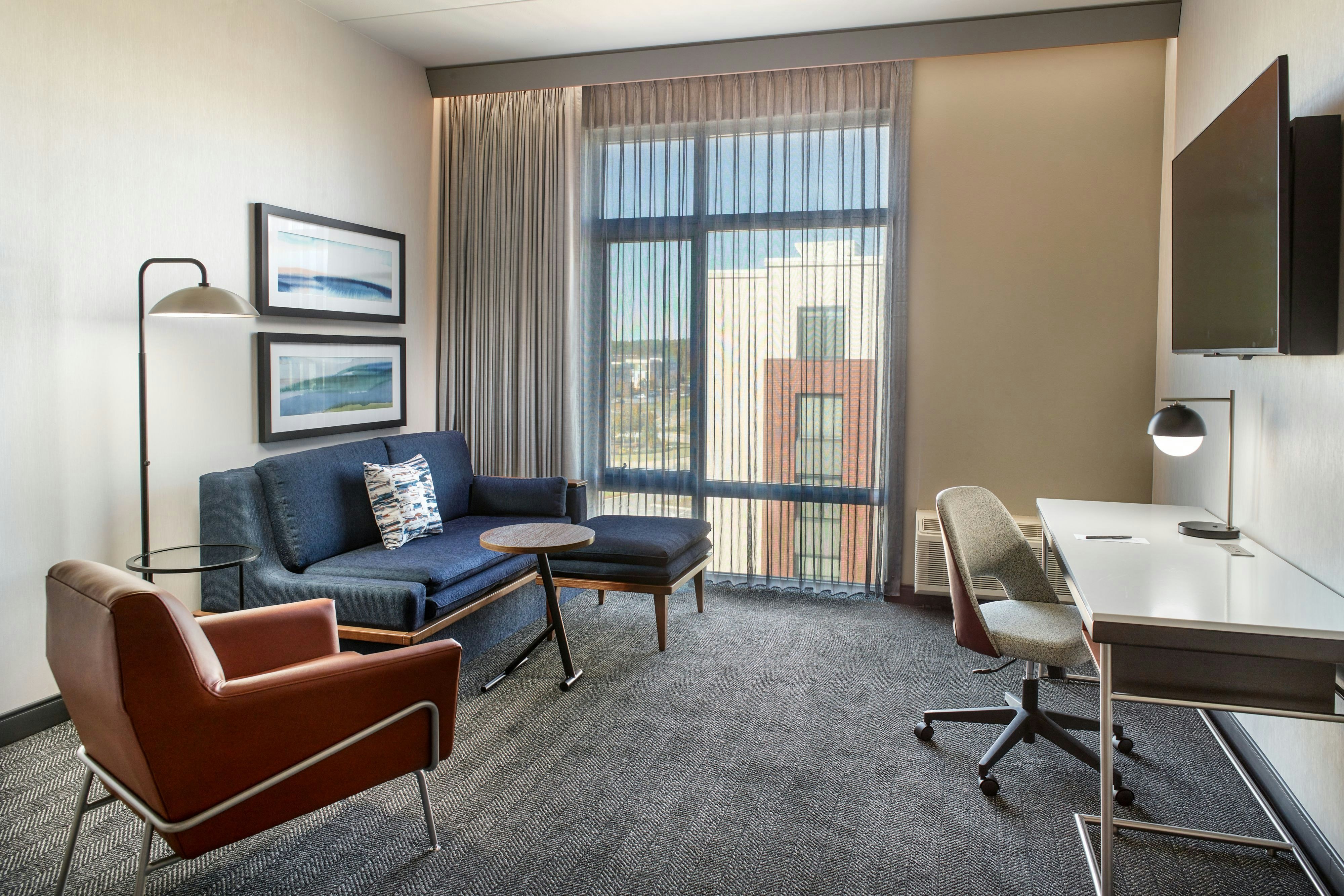 Courtyard by Marriott Atlanta Covington-guestroom-King Suite Living Room.jpg