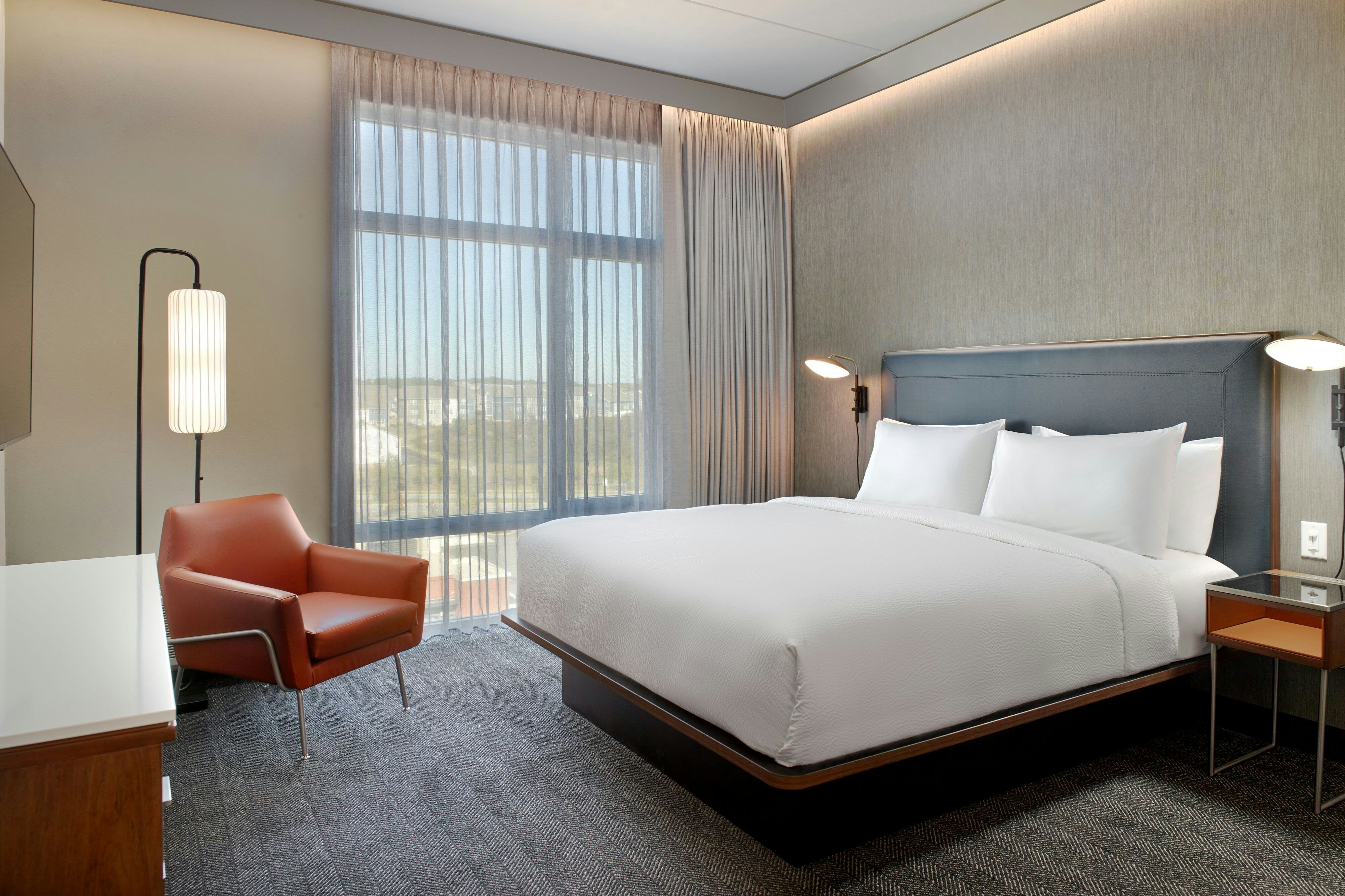 Courtyard by Marriott Atlanta Covington-guestroom-King Suite Bedroom.jpg