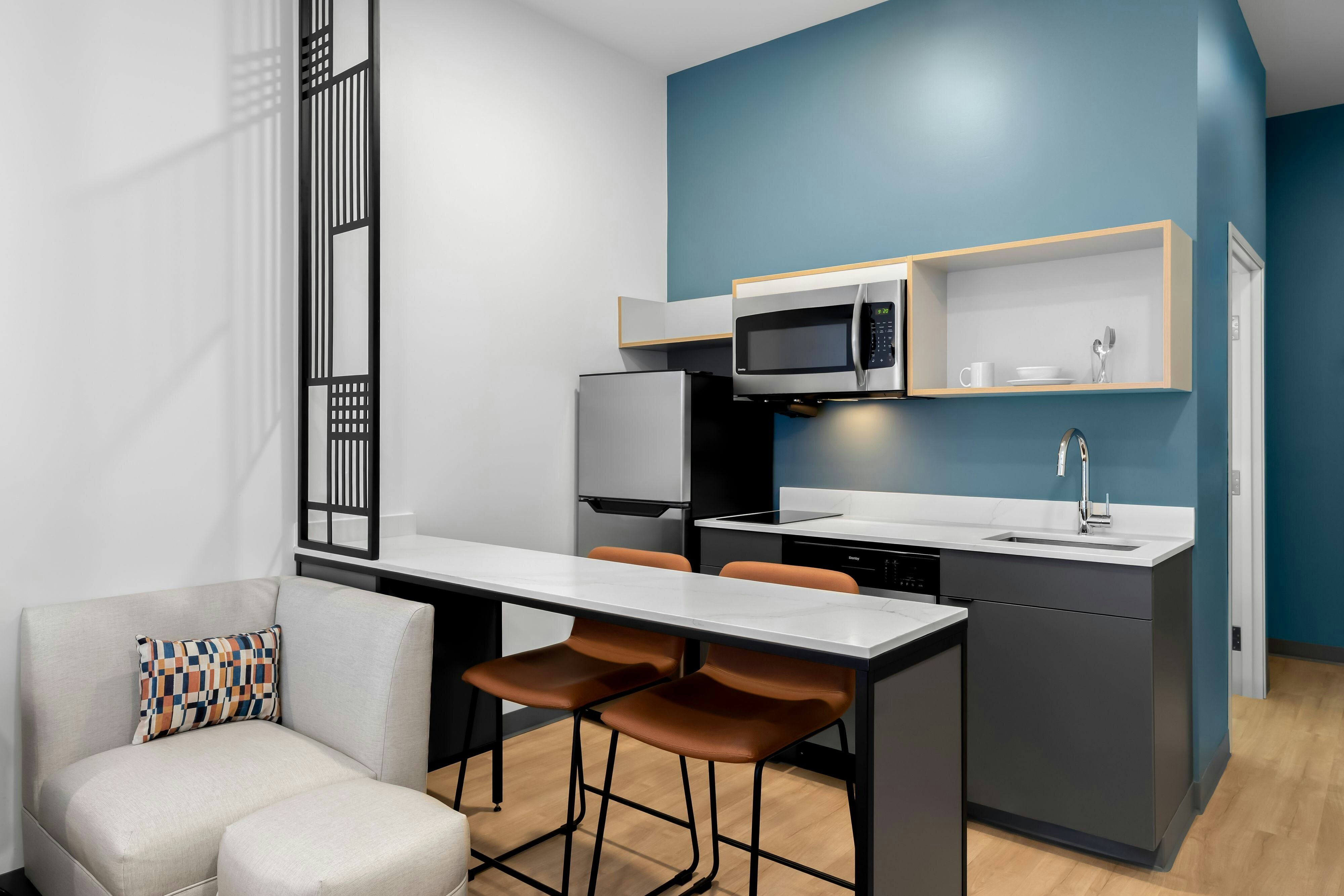 StudioRes by Marriott Newnan-guestroom-Kitchen and Seating.jpg