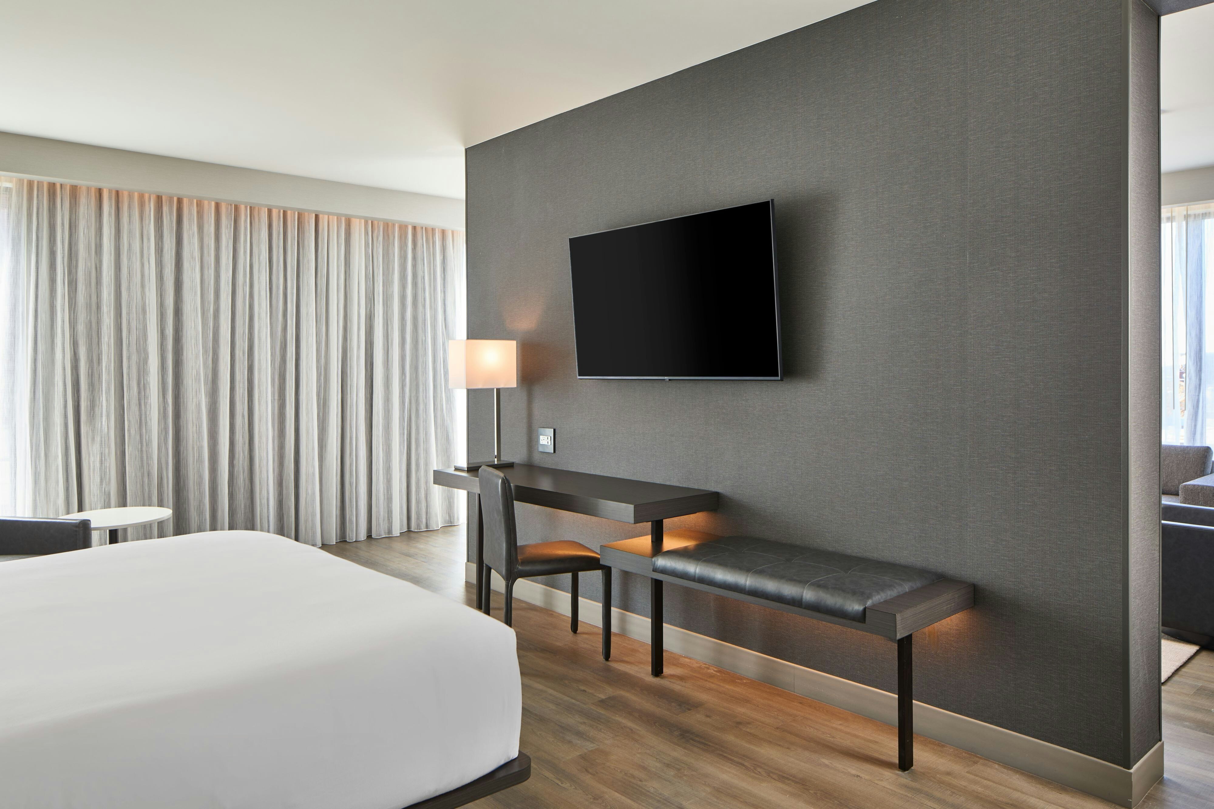 AC Hotels by Marriott Auburn-guestroom-Suite Bedroom Area.jpg