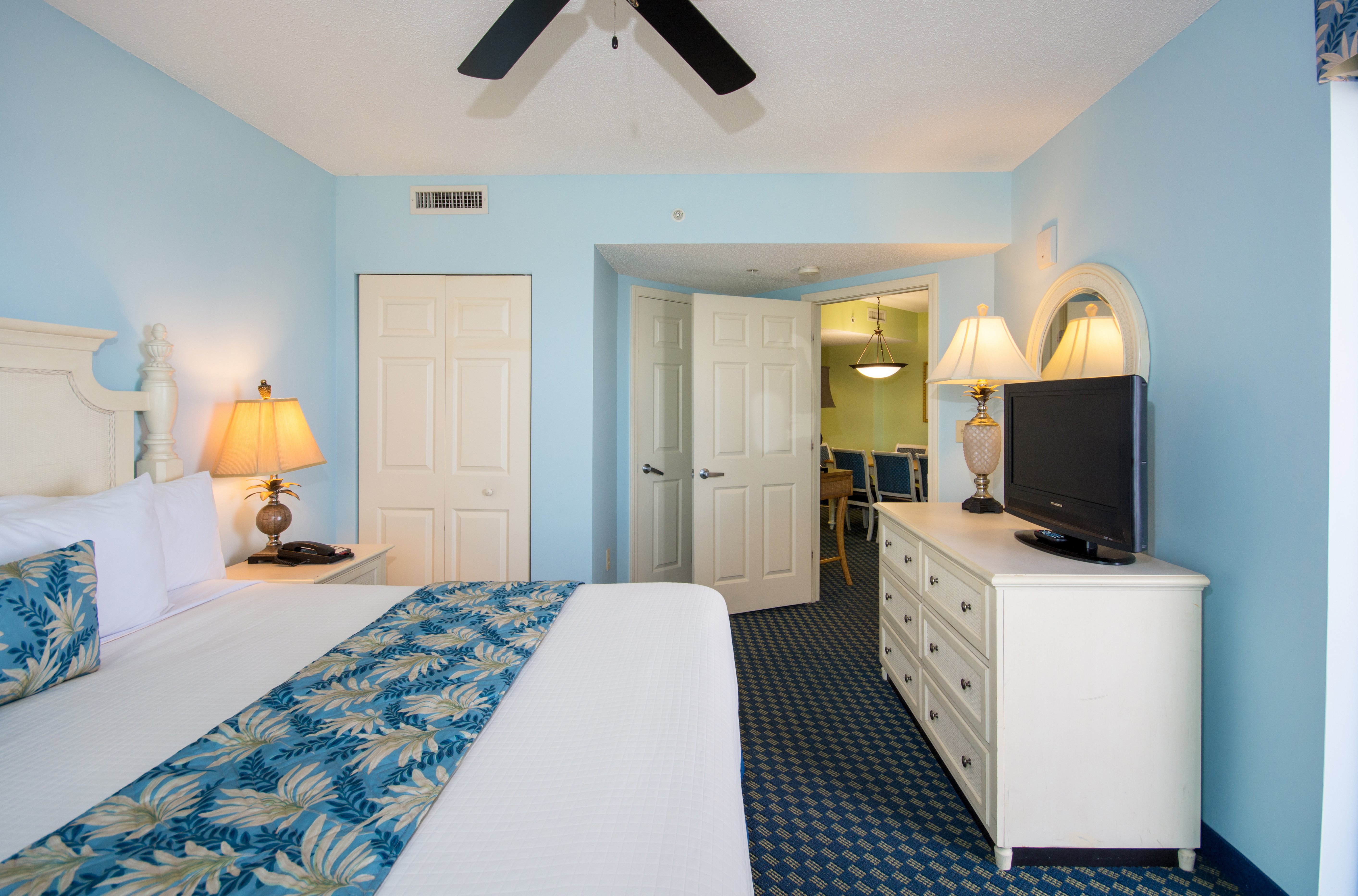 The Caribbean Resort and Villa-guestroom-caribbean cayman br oceanfront condo master bedroom.jpg