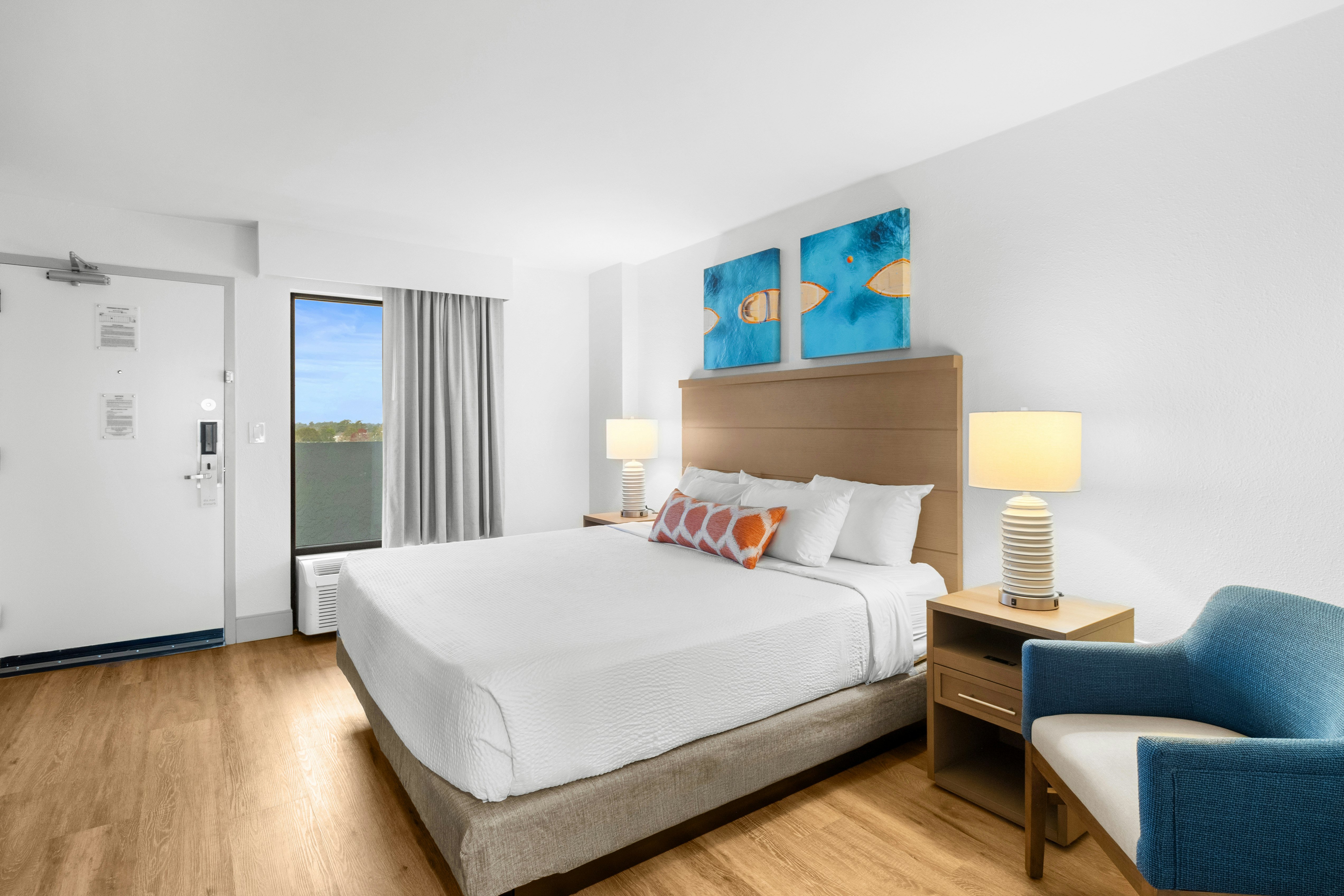 The Caribbean Resort and Villa-guestroom-caribbean cayman oceanfront deluxe one bedroom king suite unit bedroom ().jpg