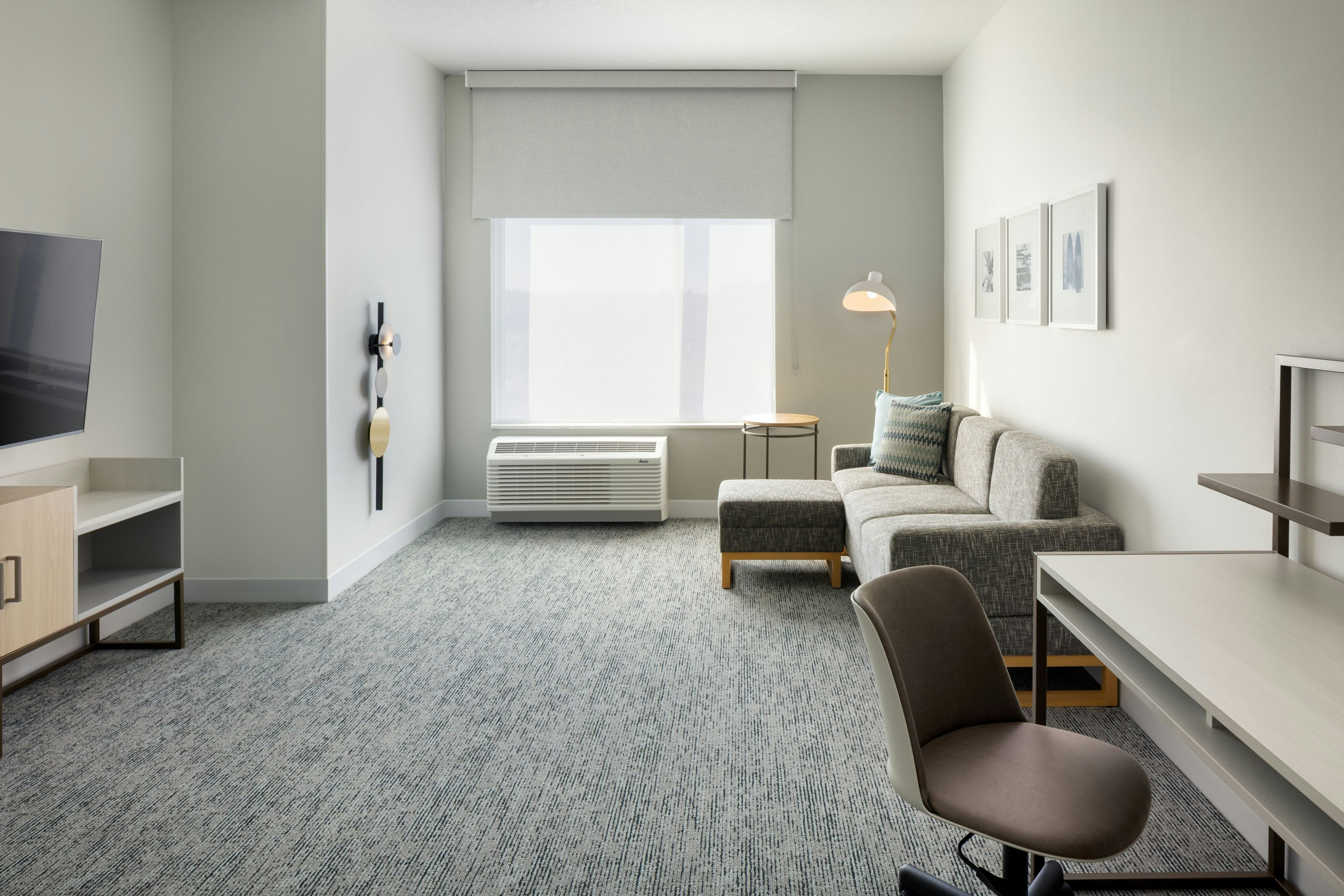 TownePlace Suites by Marriott Middleburg-guestroom-One Bedroom Suite Living Area.jpg