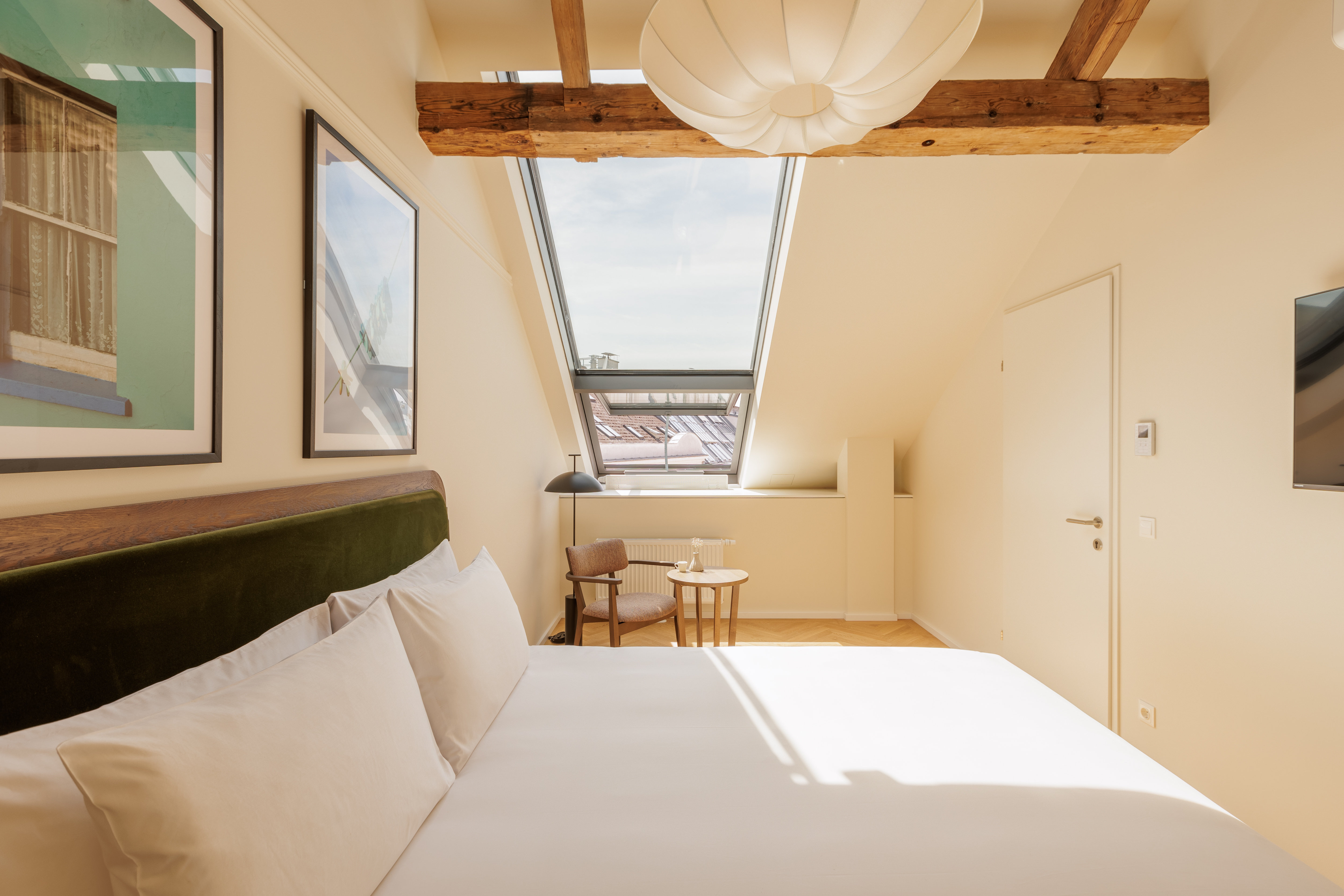 Wilde Vienna Fleischmarkt-guestroom-Bedroom Apartment King bed.jpg