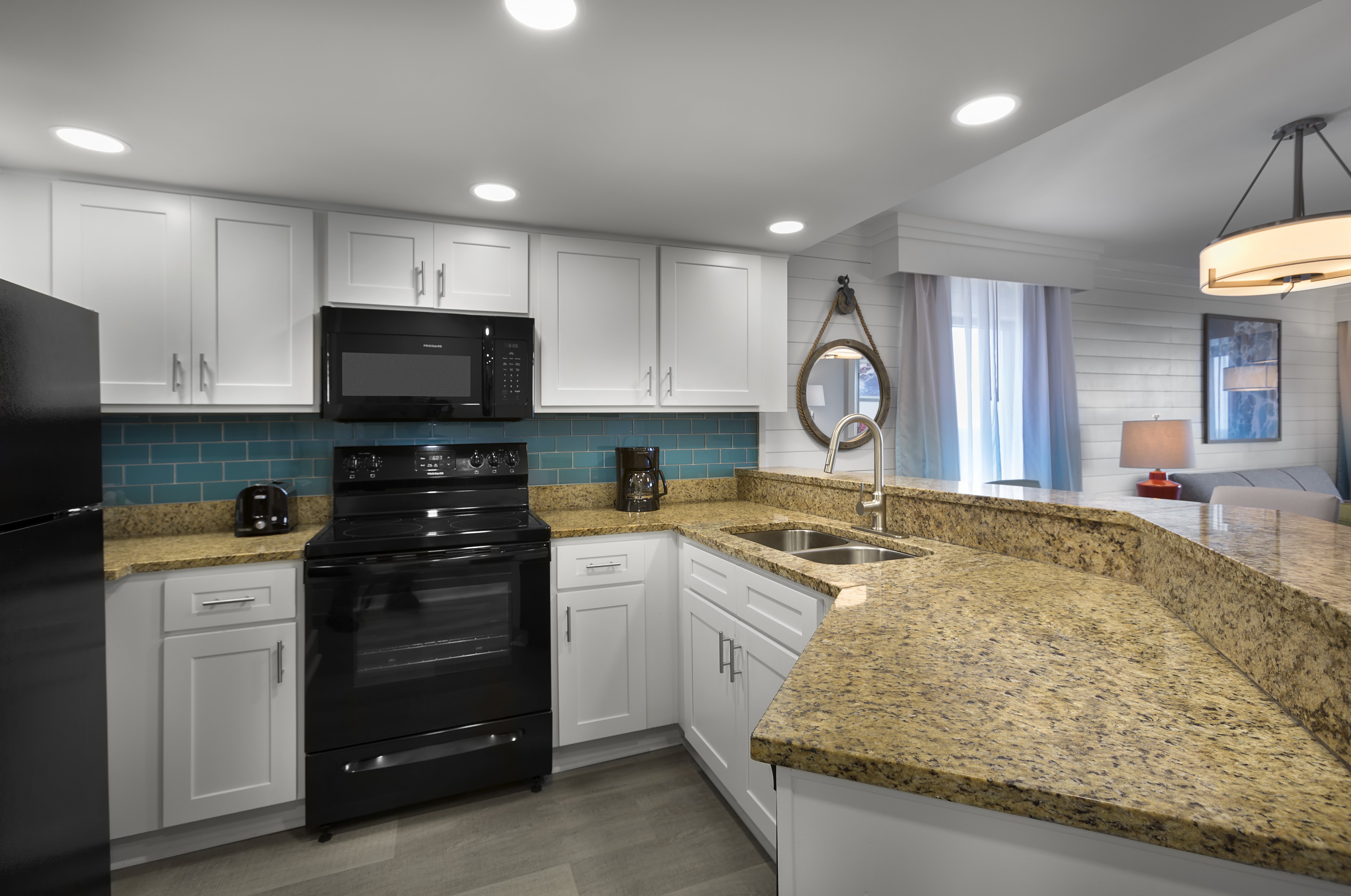 Grand Cayman Resort-guestroom-grande cayman br oceanfront condo kitchen ().jpg