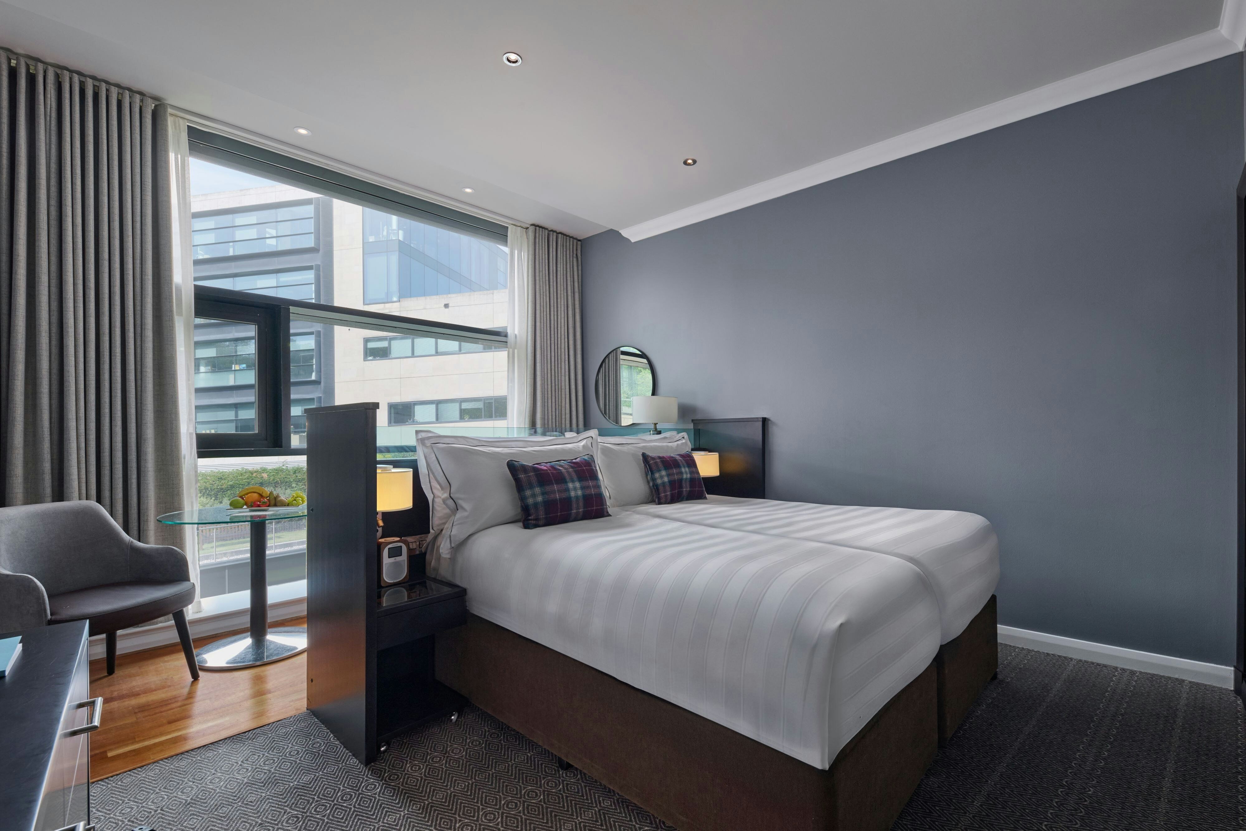 The Glasshouse Autograph Collection-guestroom-Signature room with twin bed.jpg