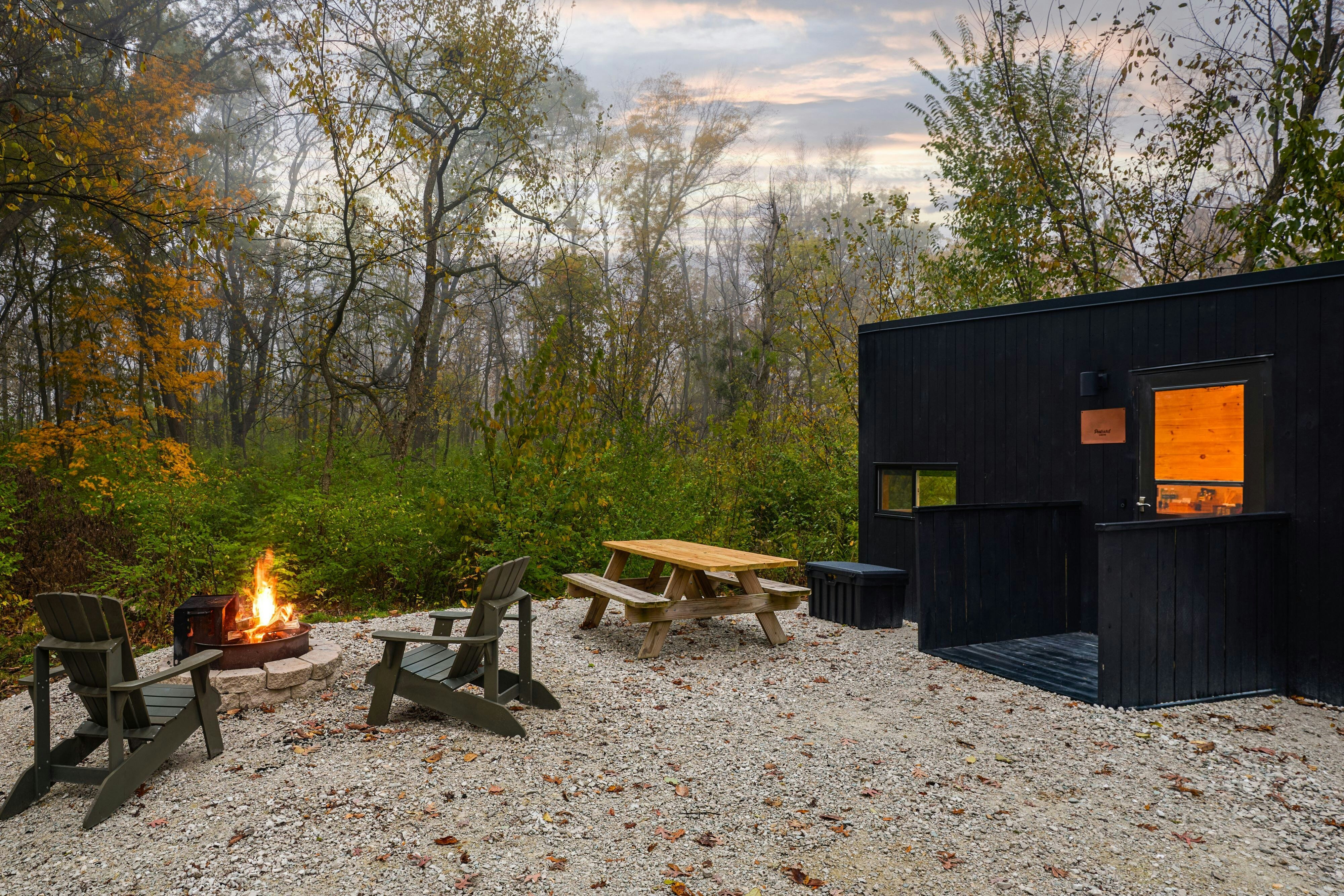 POSTCARD CABINS GILCHRIST SPRING OU-guestroom-Accessible cabin exterior dusk view.jpg
