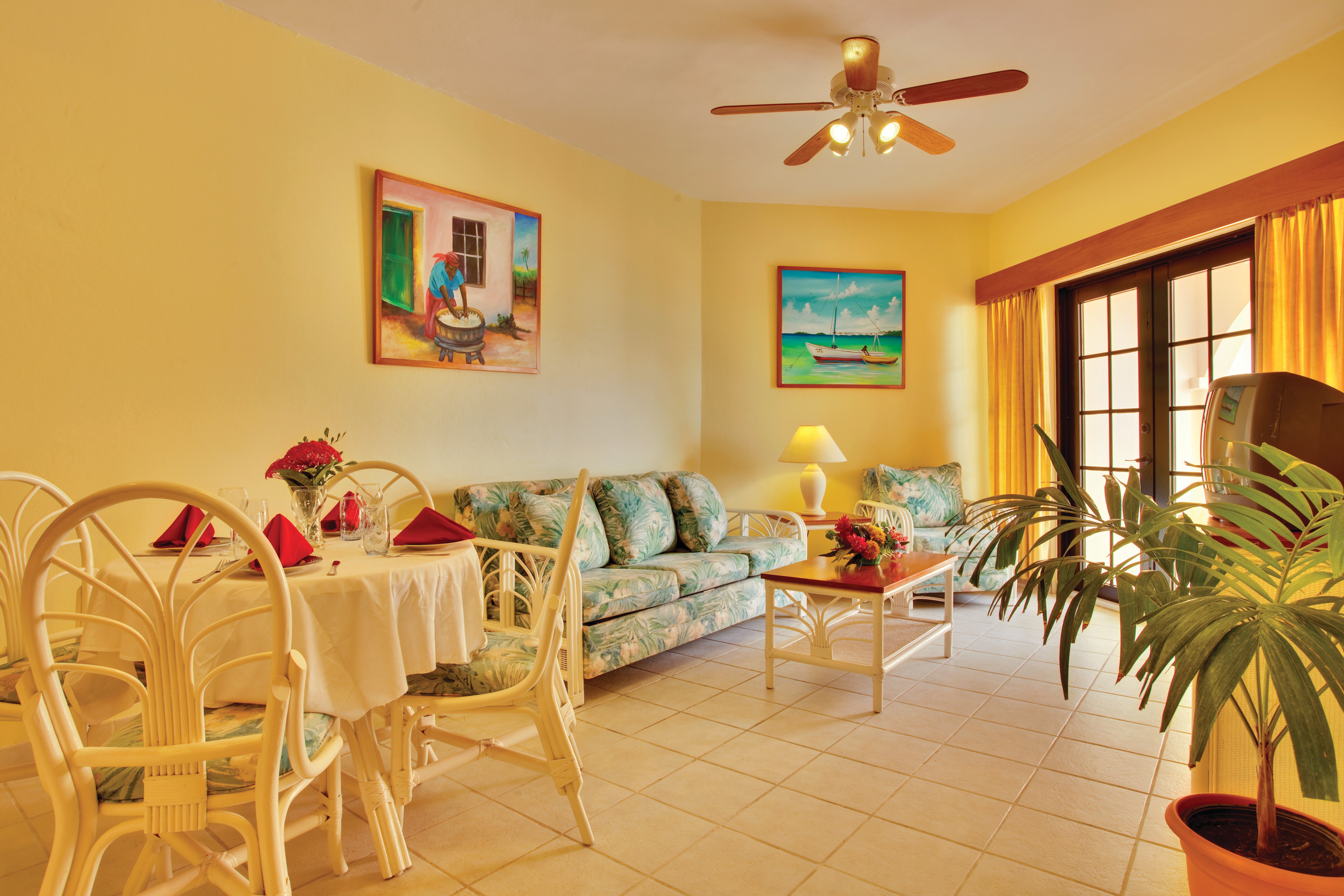 SUNBREEZE SUITES-guestroom-Living area - to Private Balcony.jpg