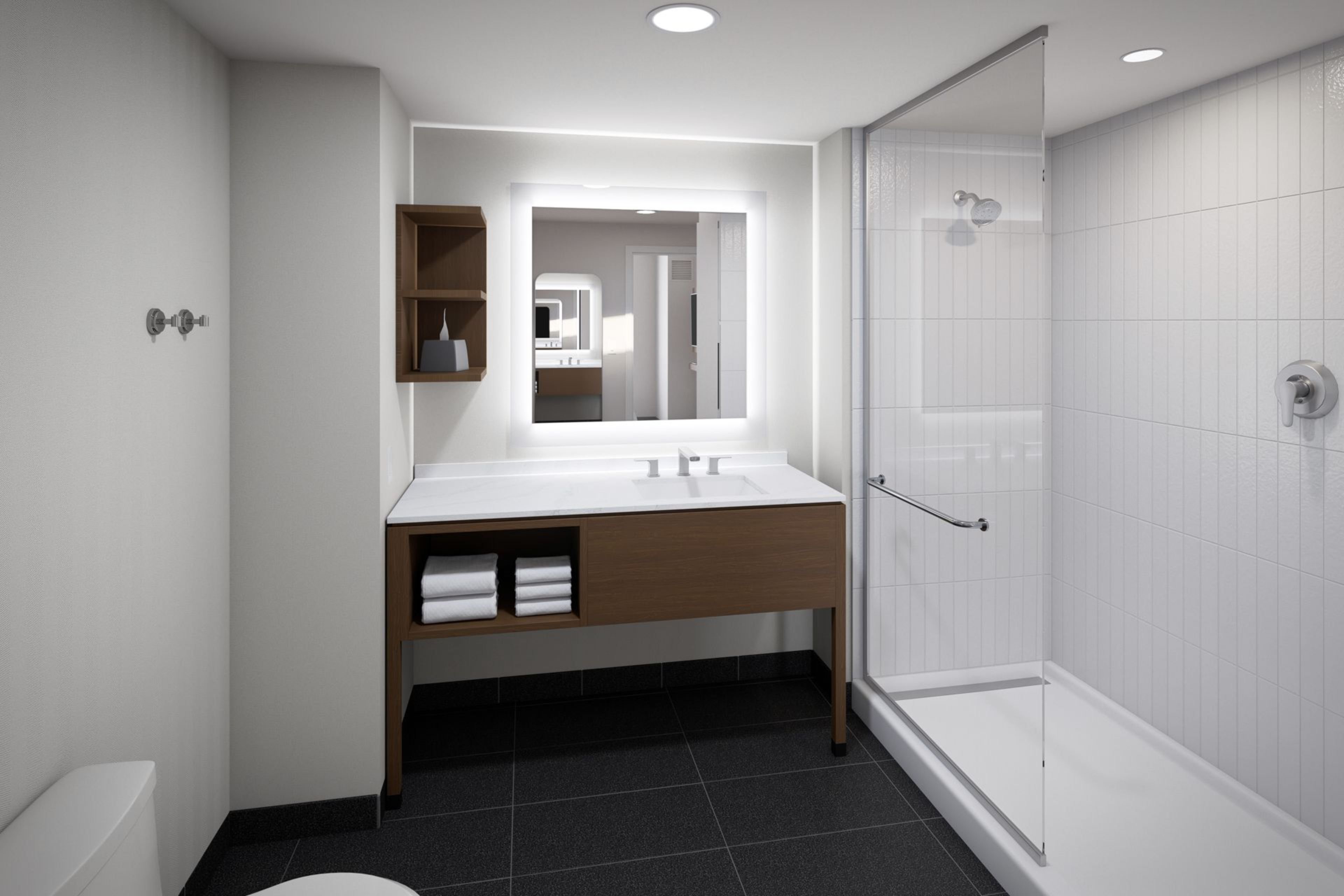 STAYBRIDGE STES EQUESTRIAN AQUATICS-guestroom-Our guest bathrooms have plenty of counter space to get ready..jpg